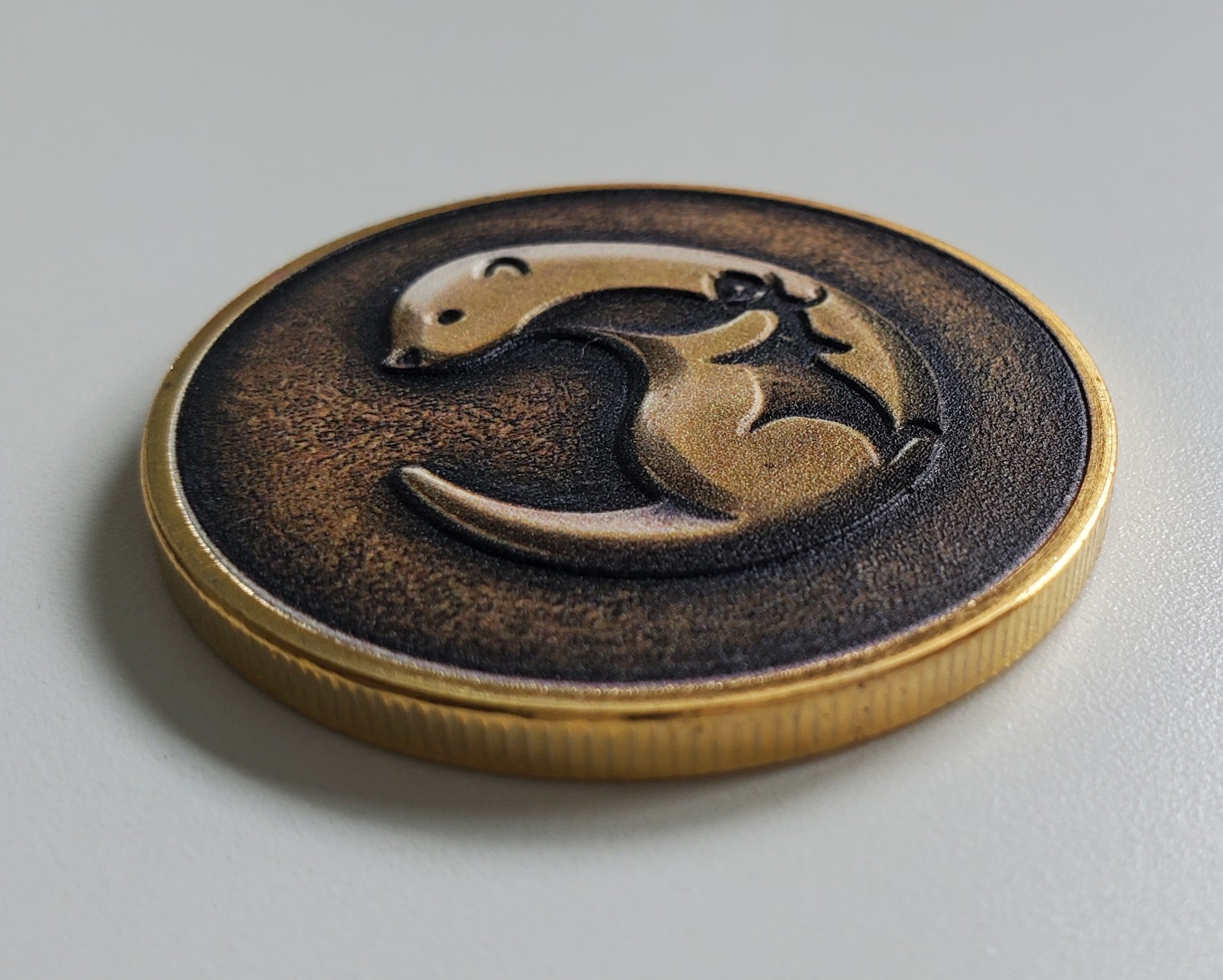 Engraved Brass "Otter" Collectable Coin