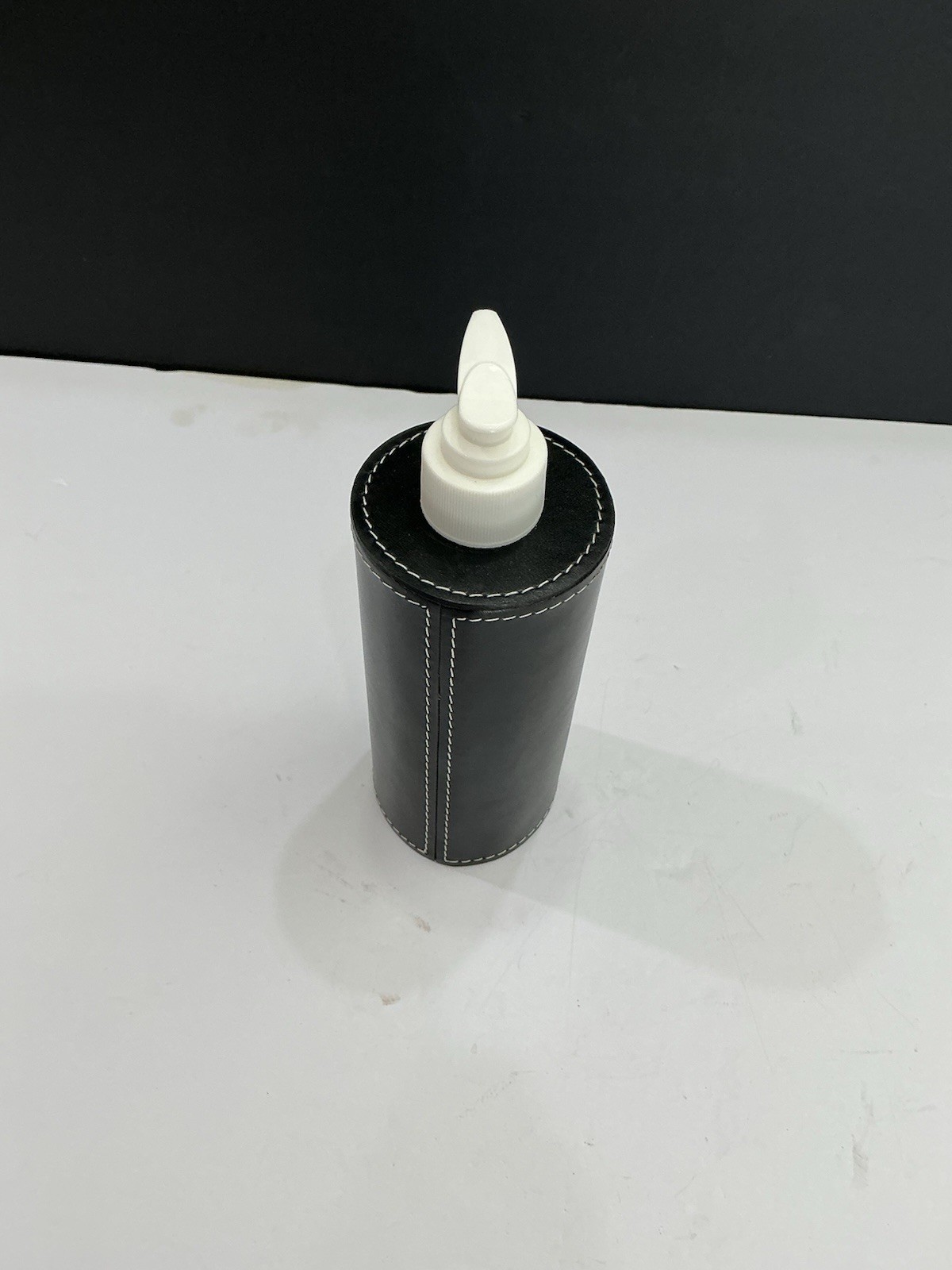 Black Leather Sleeve And Soap Dispenser