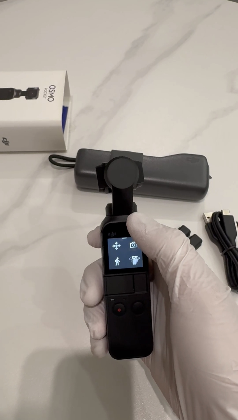 DJI Osmo Pocket-Handheld 3-Axis Gimbal Stabilizer with integrated Camera