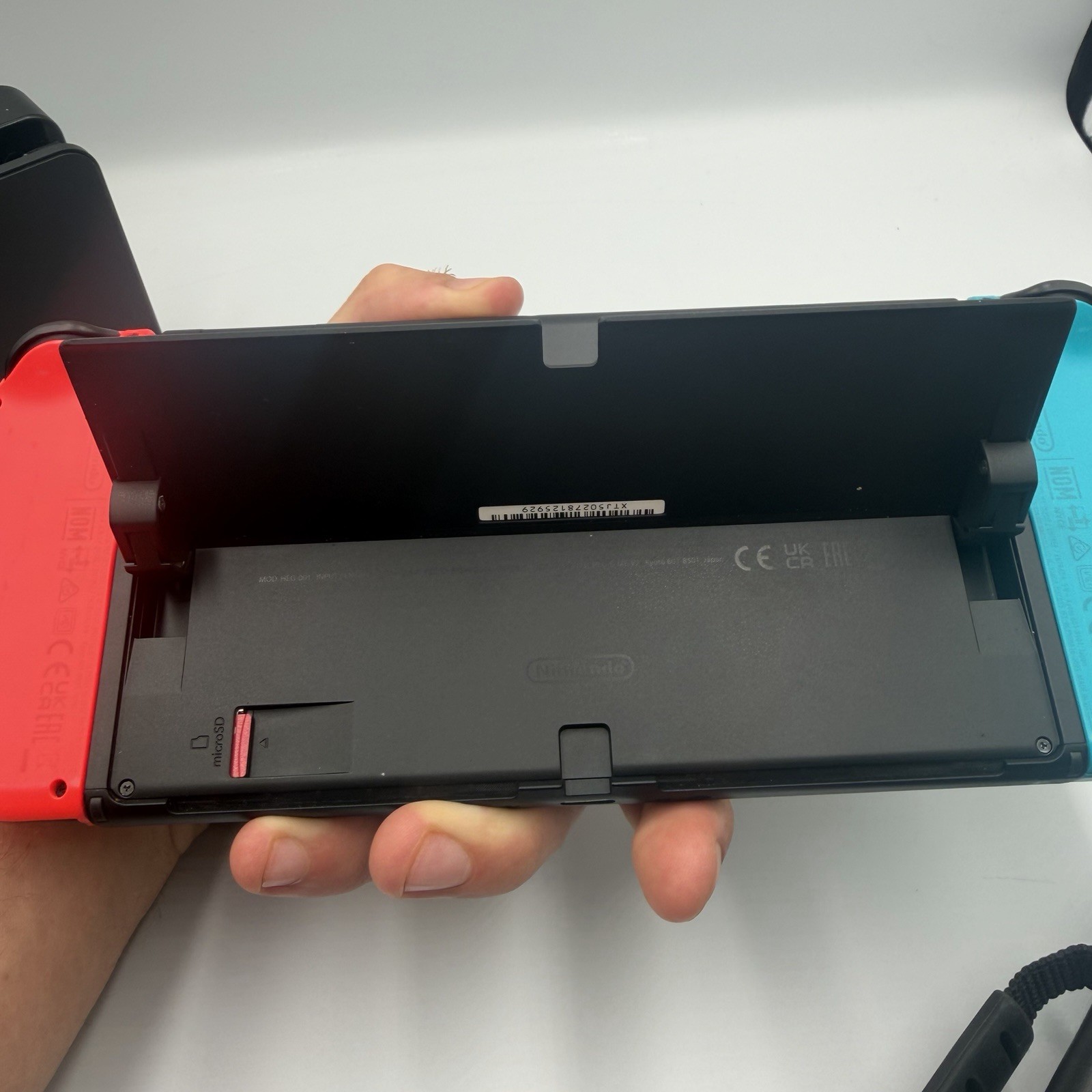 Nintendo Switch OLED Red & Blue Bundle Mario Kart 8 Deluxe