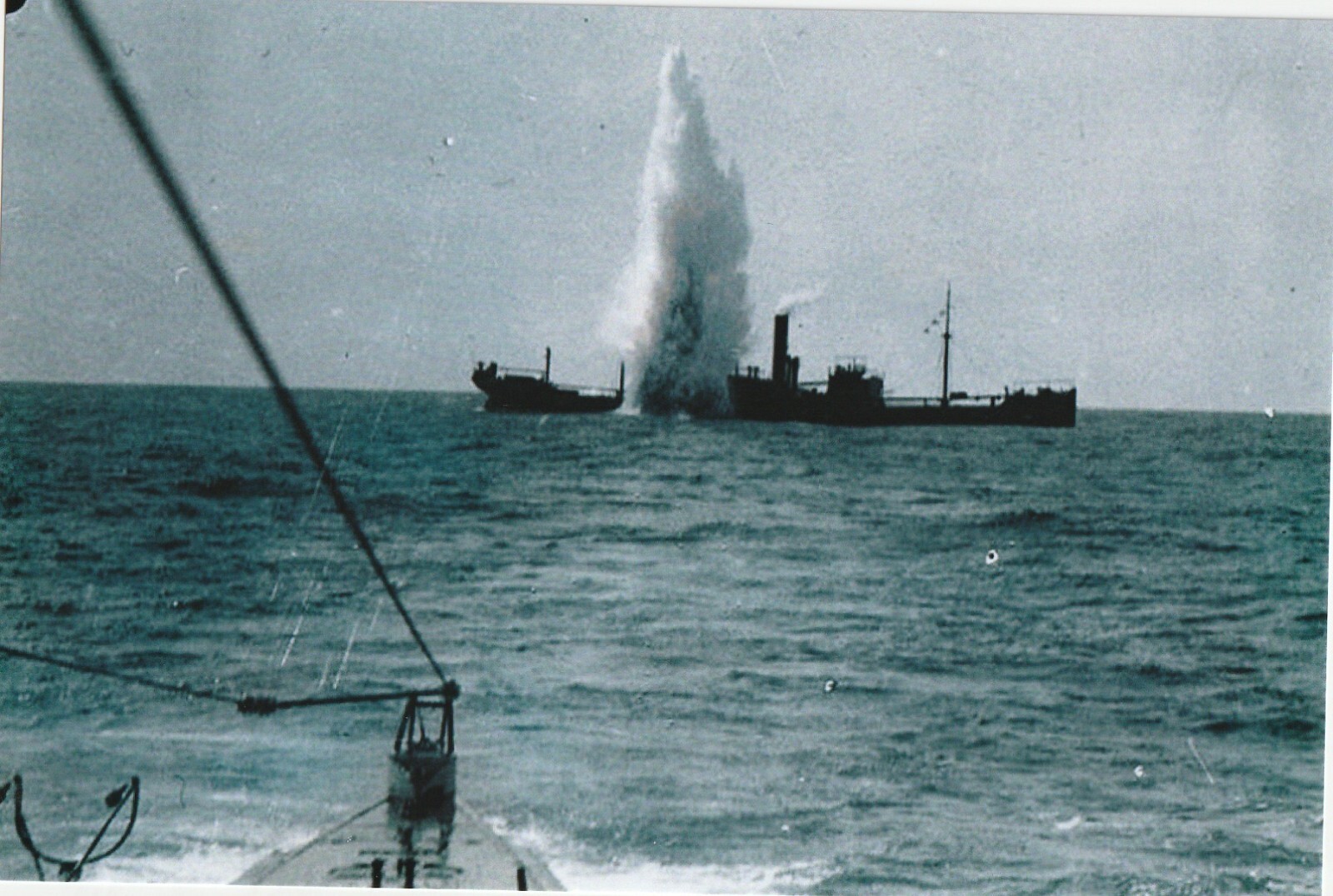 WW II German Photo ----   U - Boat Sinks Ship