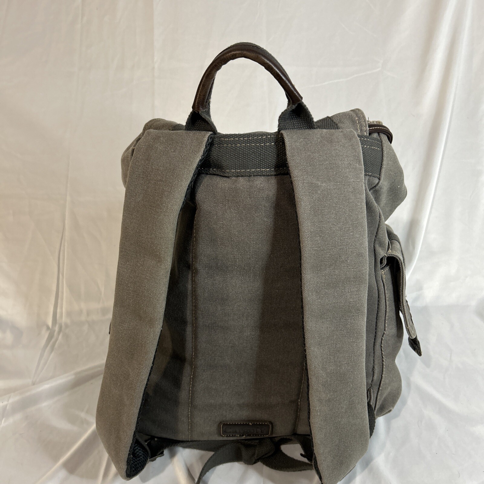 Cargoit Gray Canvas Backpack Magnetic Closures Pockets Straps and A Deep Inside