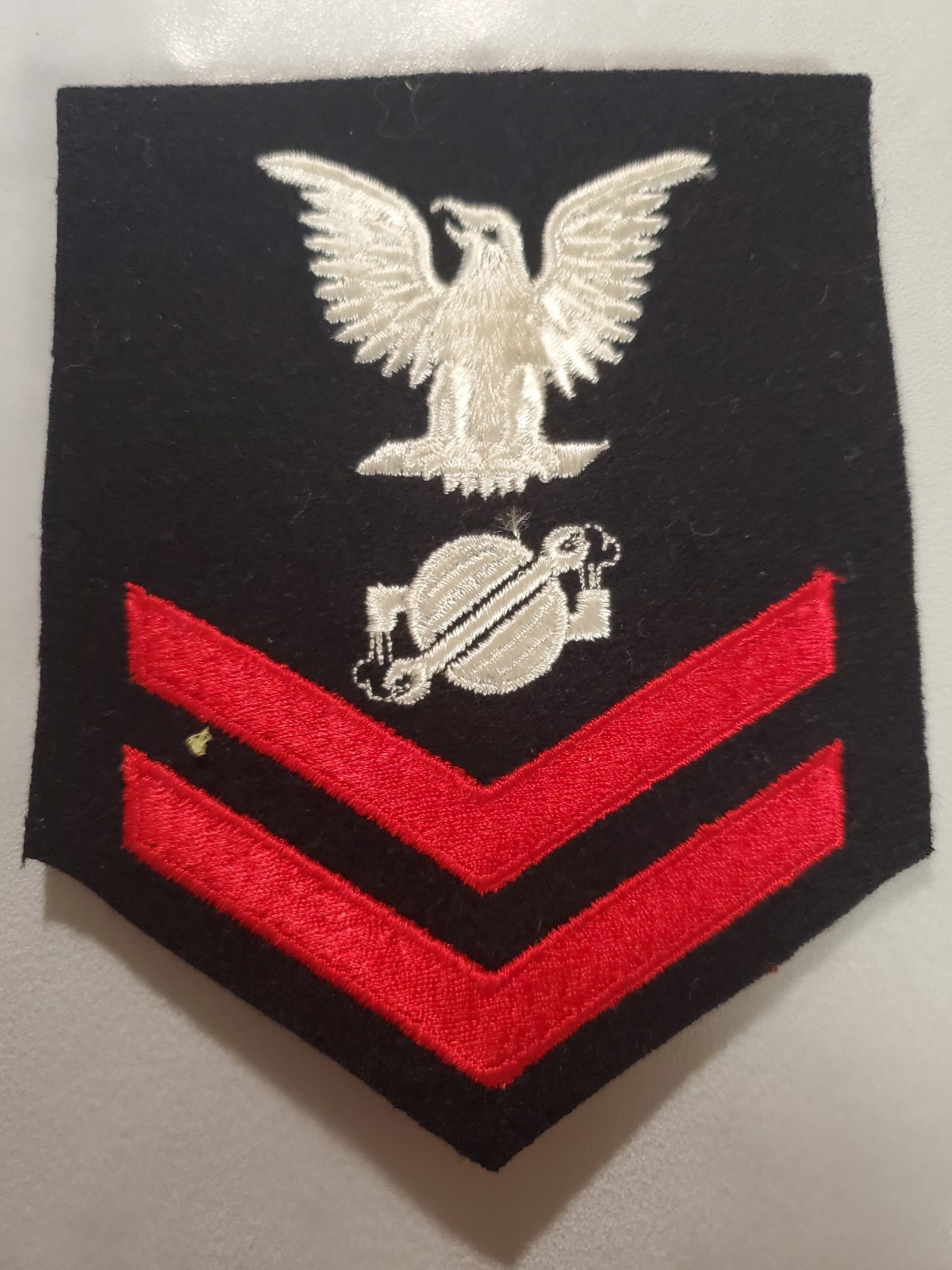 WWll Era U.S. Navy Rating Badge for a Machinist's Mate Second Class (MM2)