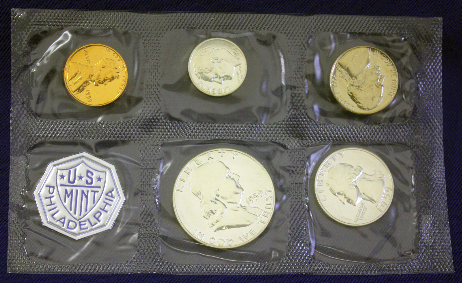 1959 U.S. PROOF SET. The Coins are U.S. Mint Sealed in a flat cello. Open Env.