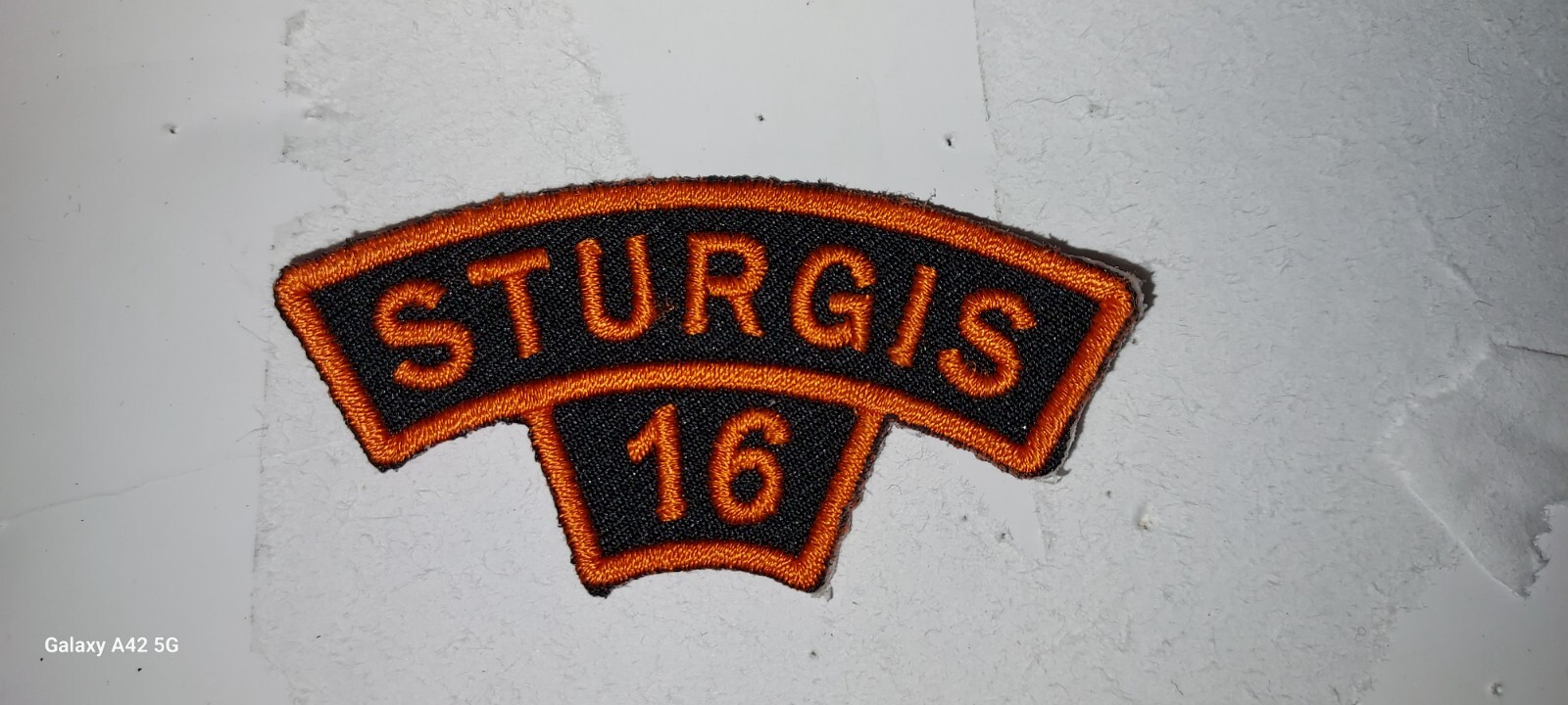 STURGIS Harley Motorcycle Rally ROCKER Patch 2016 Orange Black 2-Digit Year