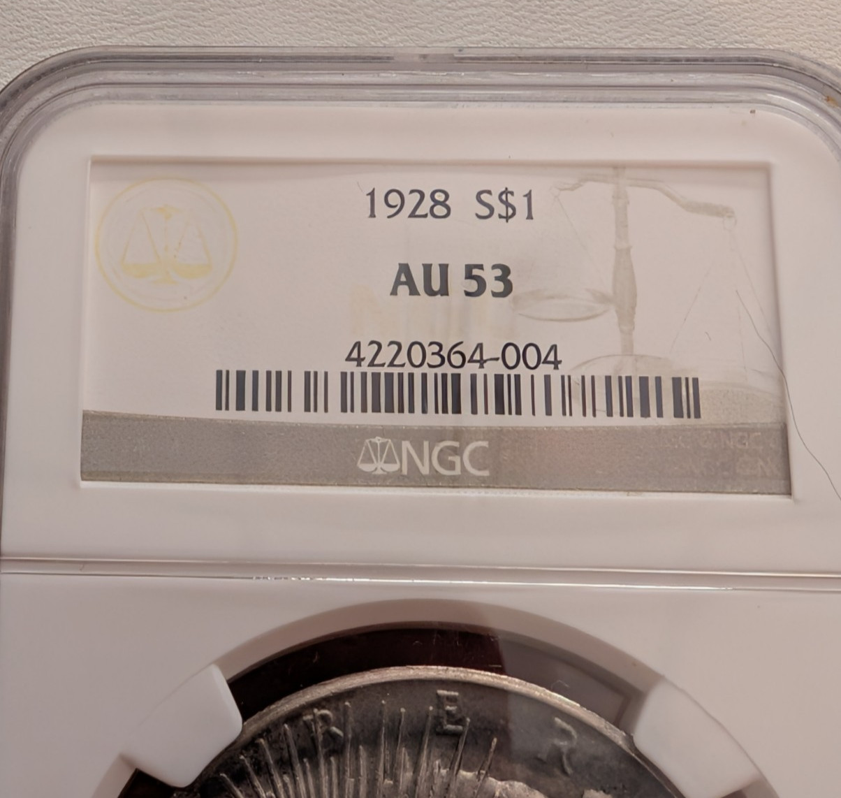 1928P Peace Silver Dollar $1 NGC AU53 250825