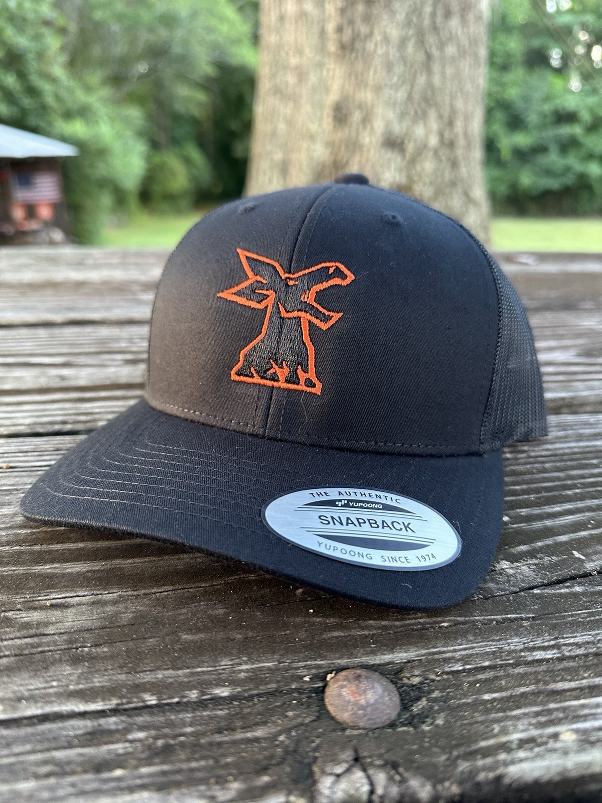Timberjack Logging Equipment Hat.Yupoong 6606.fit Like Richardson 112.blk-orange