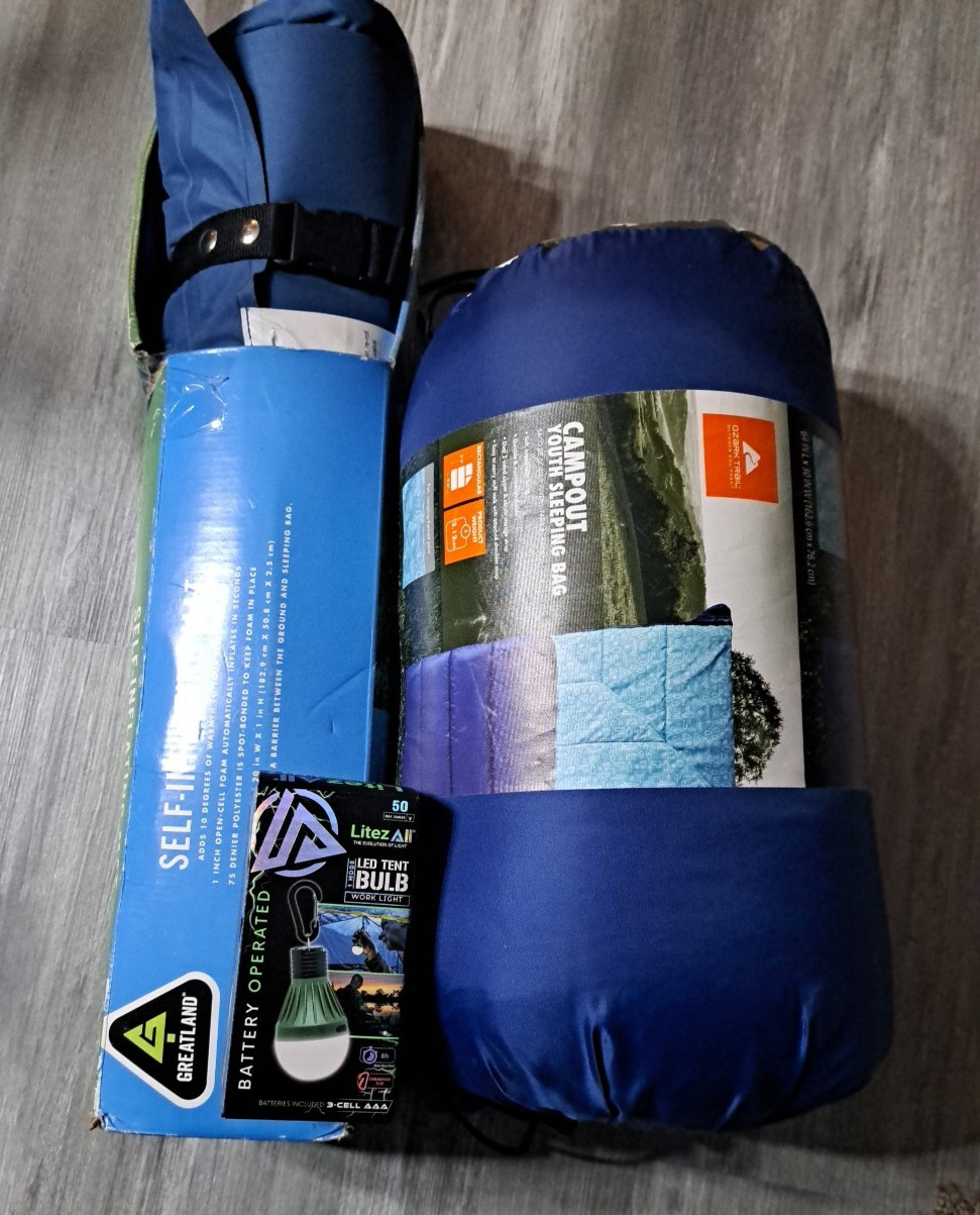 self-inflating mat and youth sleeping bag with portable light set - all new