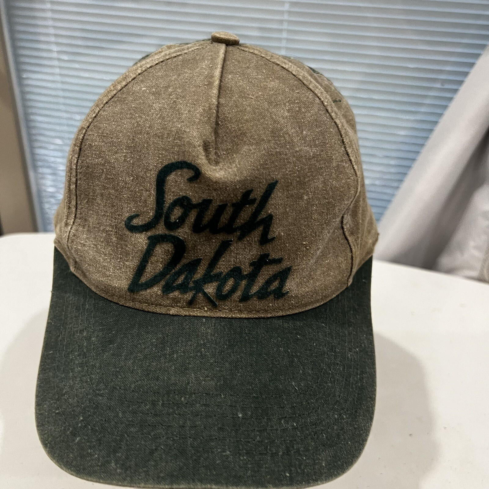 South Dakota Letters on Tan Green Hat Cap Washed Out Look Strap Buckle Kati