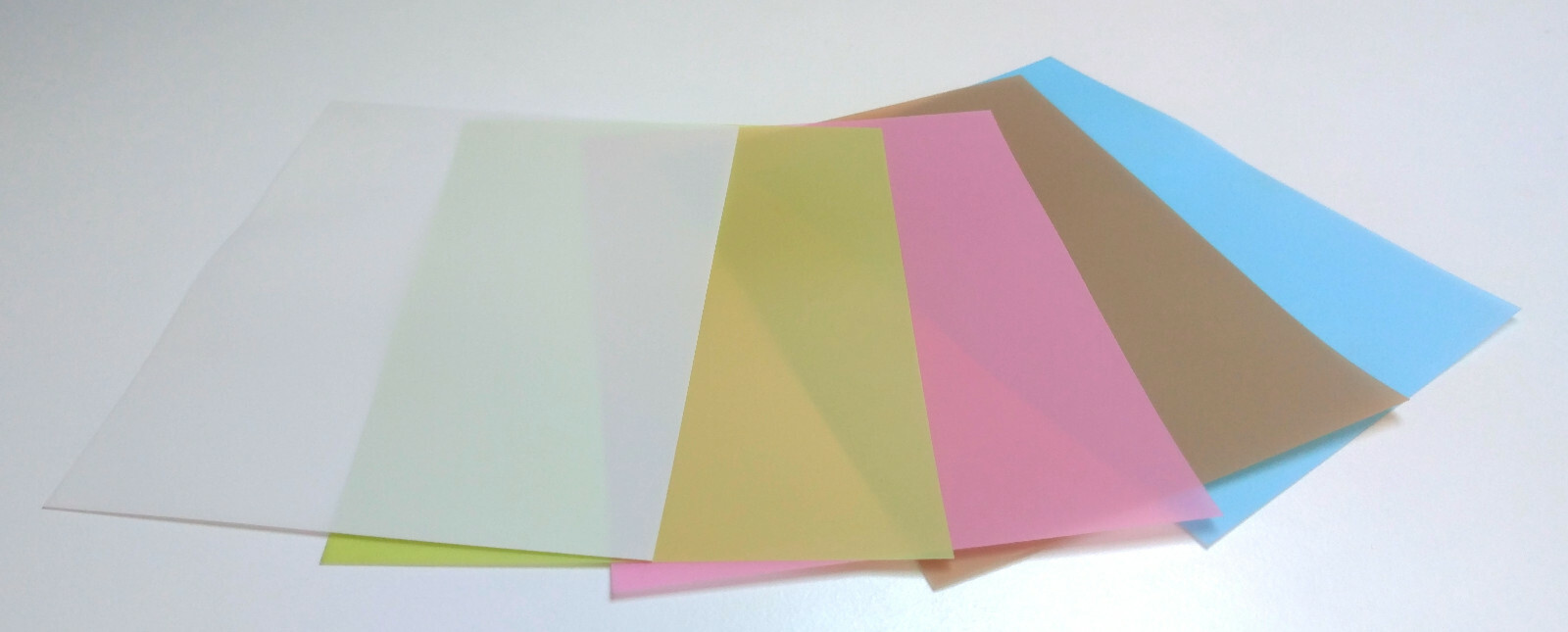 Five sheets, grit variety 9-0.3 μm grit, 3M lapping film, fountain pen, mylar