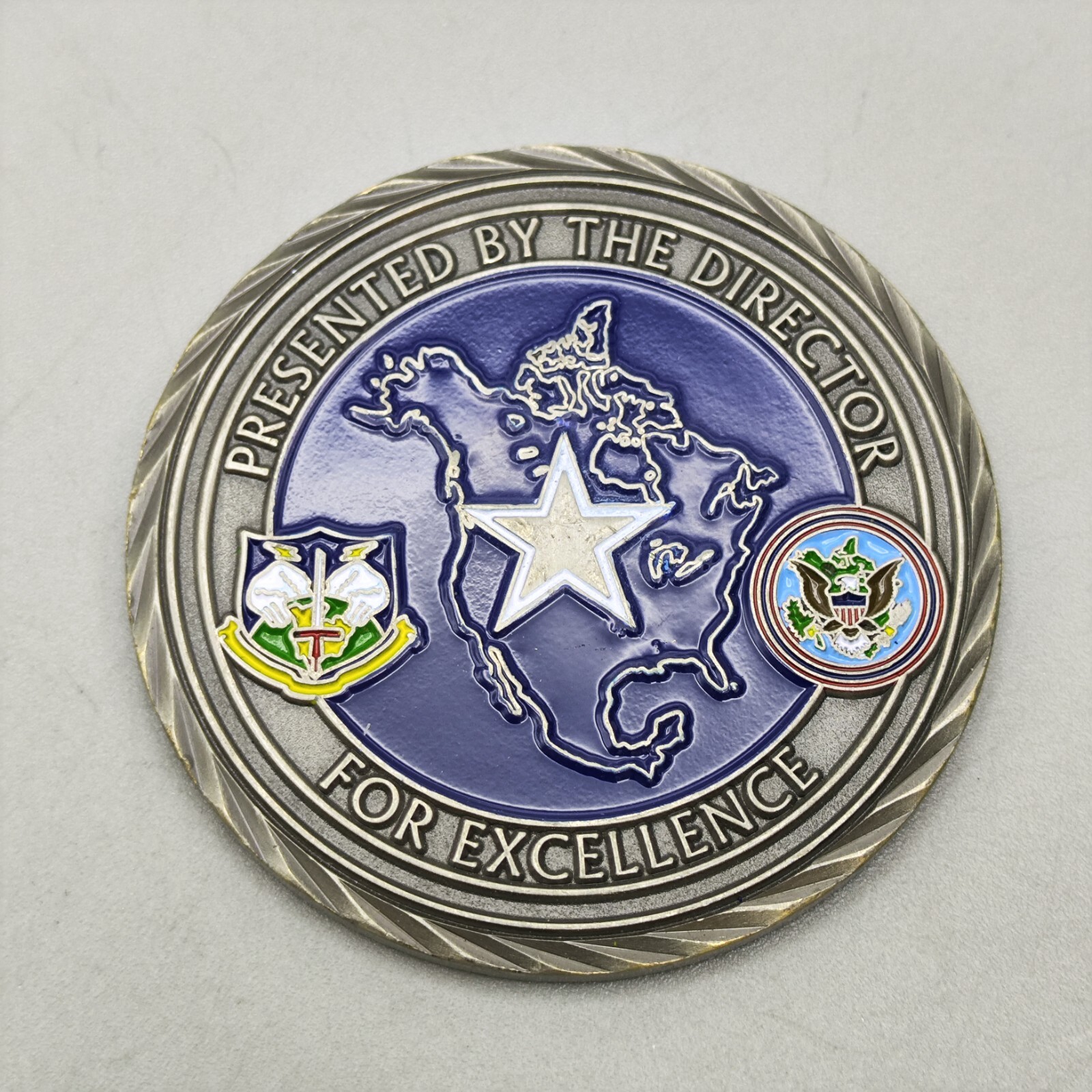 Presented by the Director for Excellence Cyberspace Operations Challenge Coin