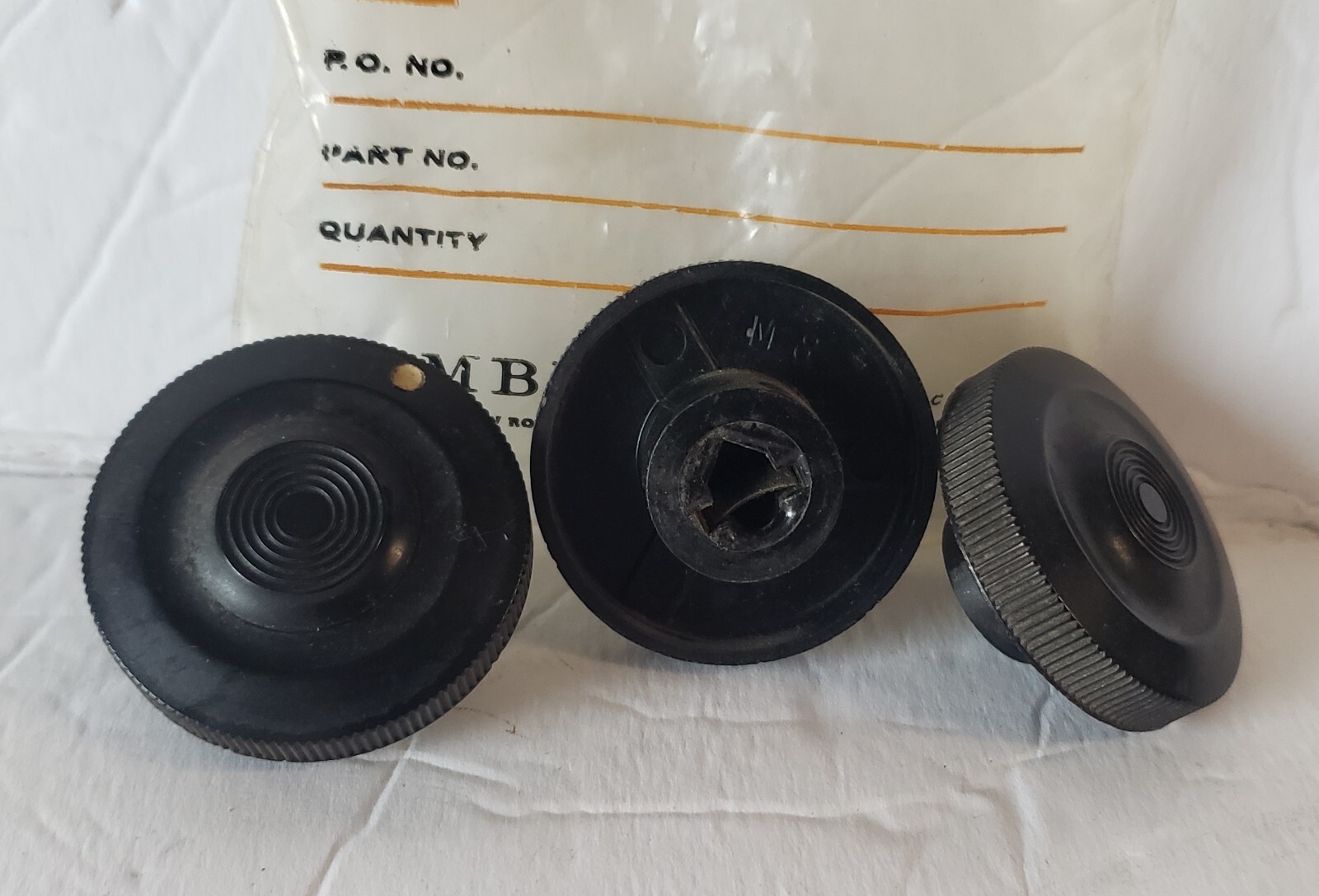 bag of (3) Lambda Power Supply plastic knobs