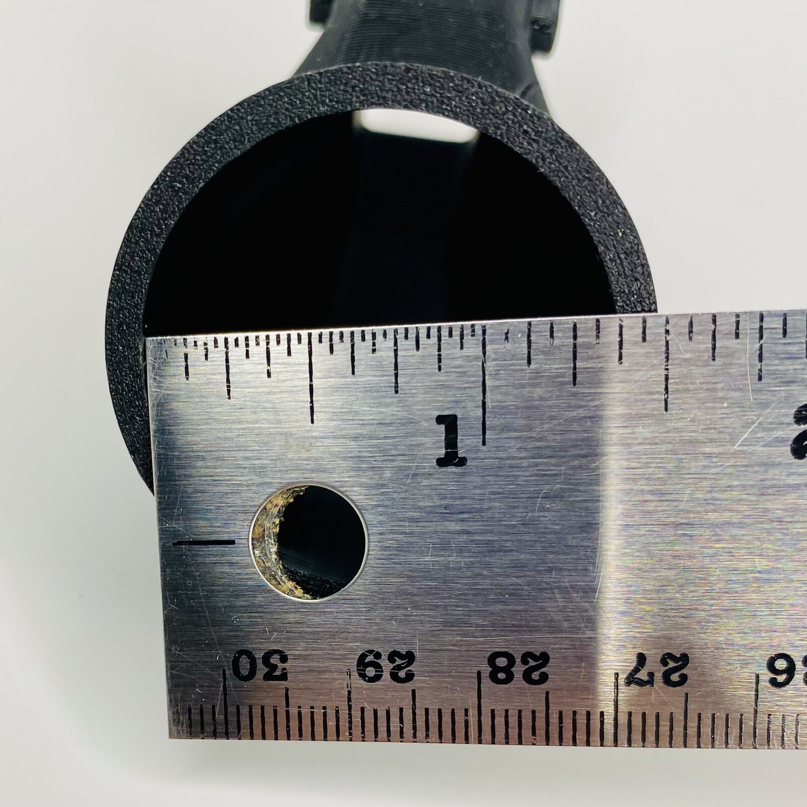 Adapter for DeWalt DW433 belt sander dust port to a common Shop-Vac 1-1/4" hose.