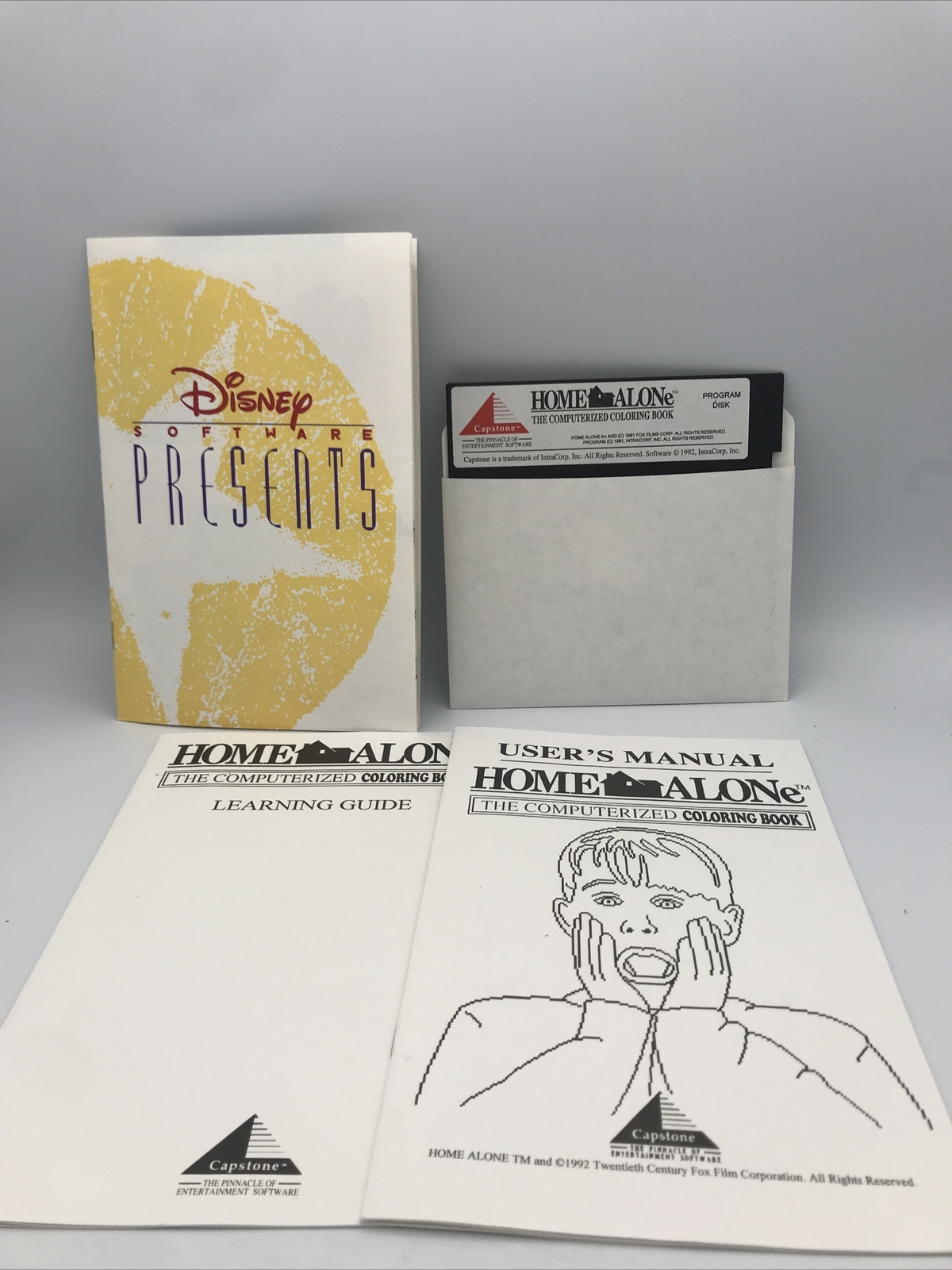 CAPSTONE HOME ALONE THE COMPUTERIZED COLORING BOOK FLOPPY DISKETTE & MANUALS