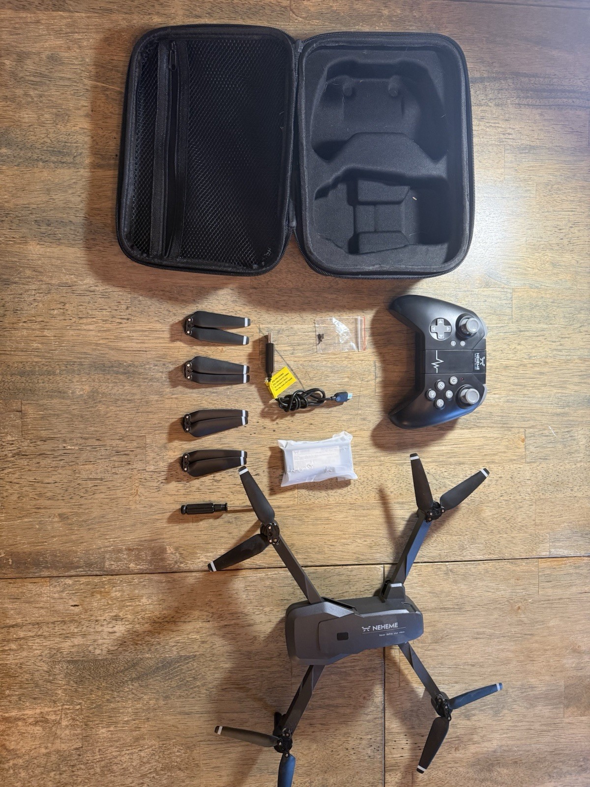 NEHEME NH760 Foldable Quadcopter Drone w/ Remote, Case, Battery, Props