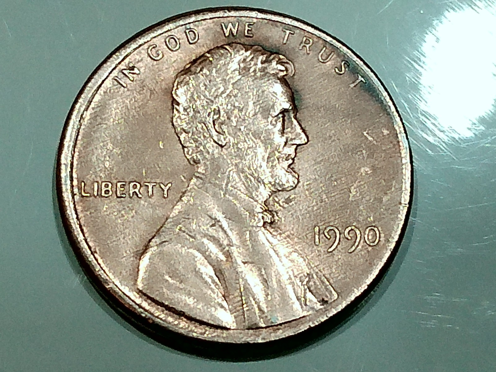 1990 us zinc penny-(error) DD on united states - 1988 fg on 1990 coin- woodgrain