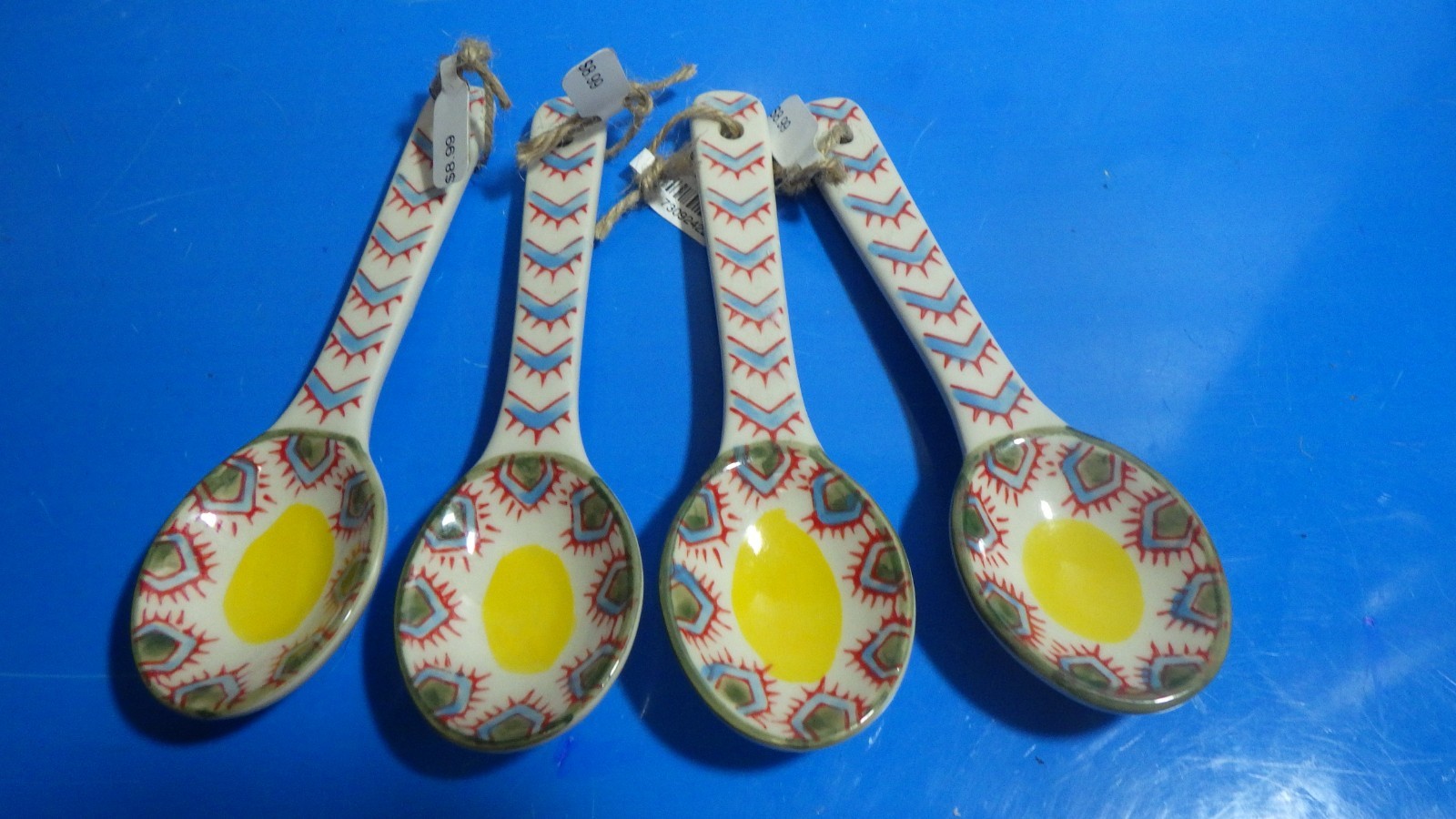 4 artsy egg yolk colorful pattern soup spoons hand painted stoneware 5.25" L