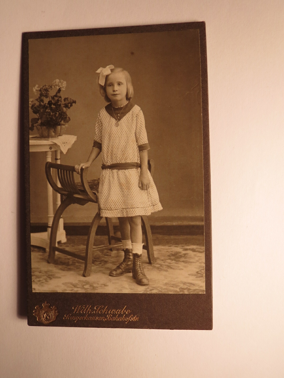 Standing girl with bow in her hair/CDV Wilhelm Schwabe Sangerhausen