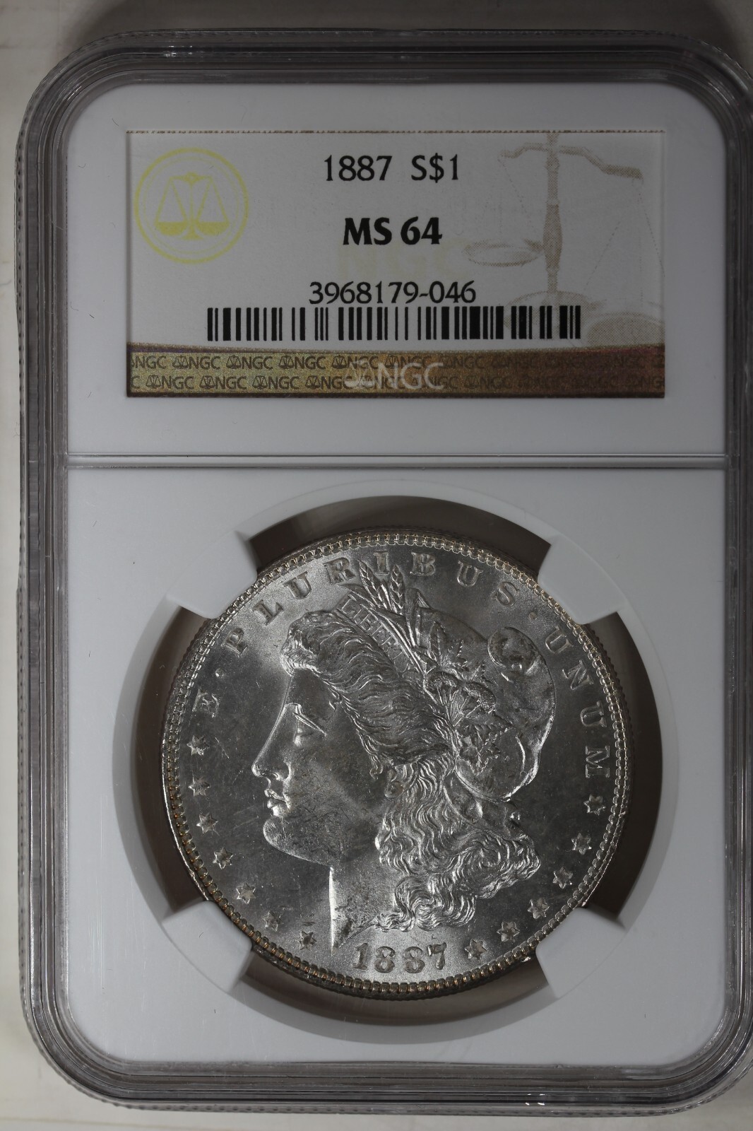 1887  1.00  NGC  MS64     Morgan Silver Dollar, Miss Liberty Head Dollar