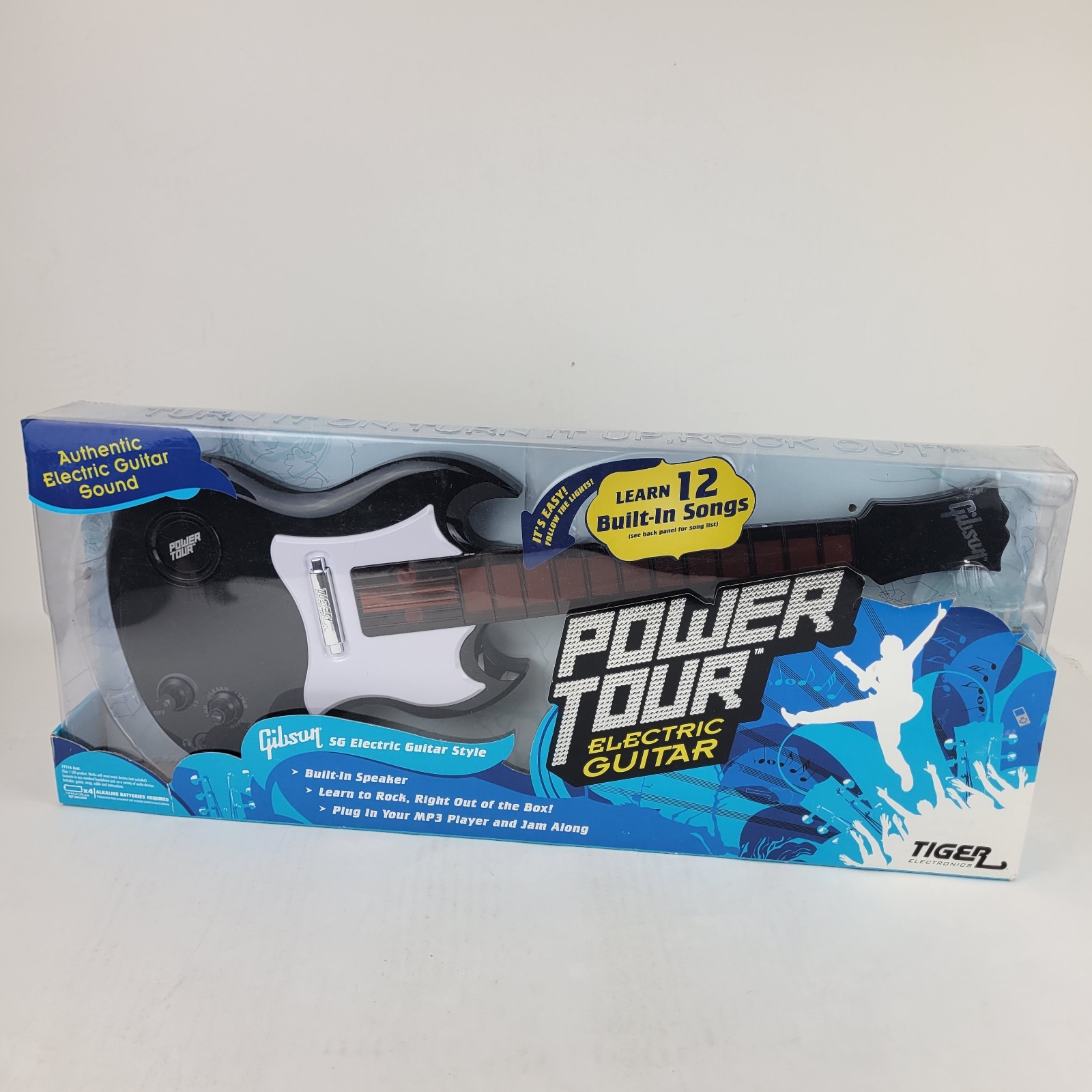Tiger Electronics Power Tour Black Gibson Electric Guitar Toy. New Sealed Box