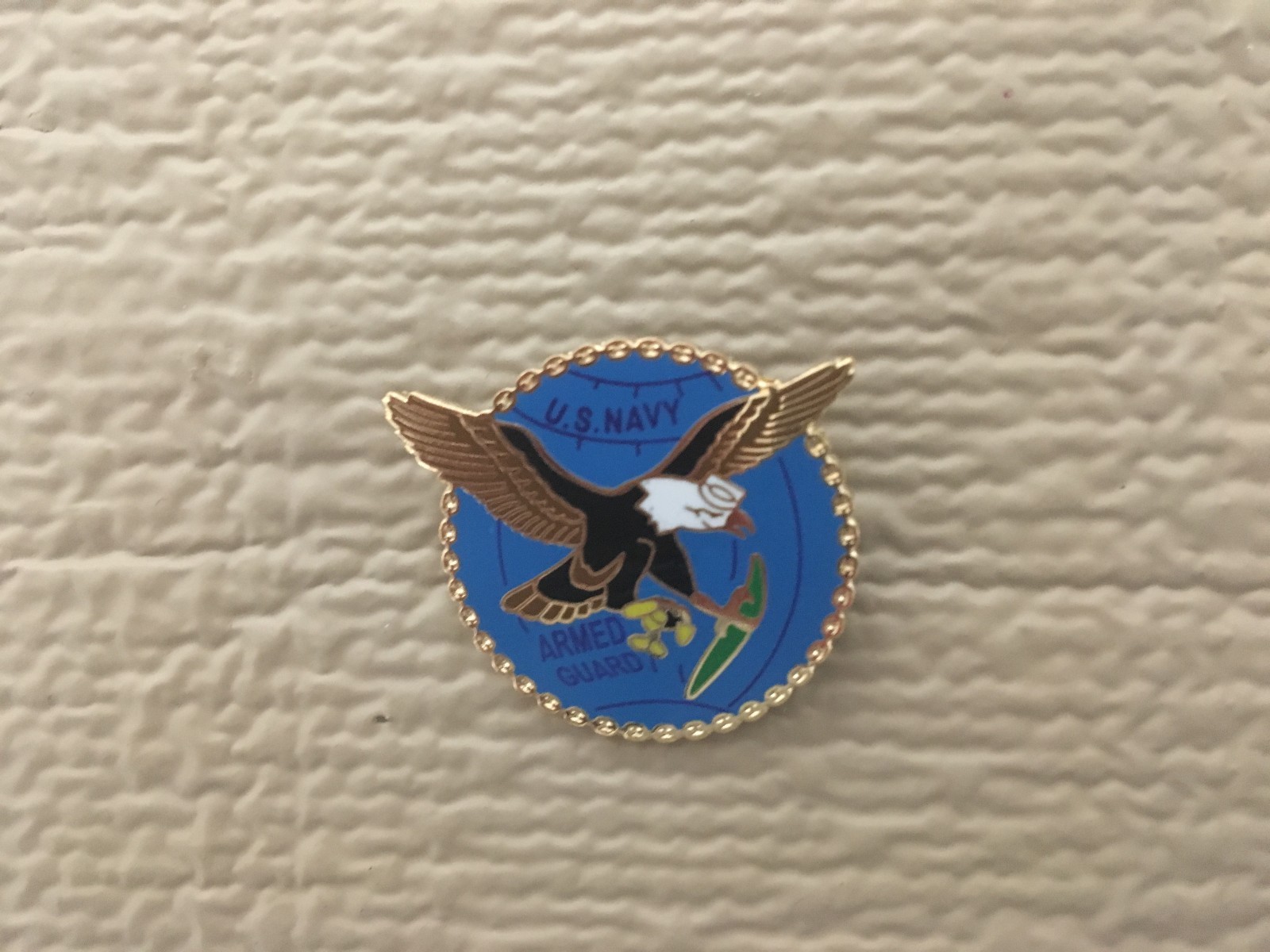 US NAVY ARMED GUARDS HAT PIN MEASURES 1 AND 1/4 INCHES
