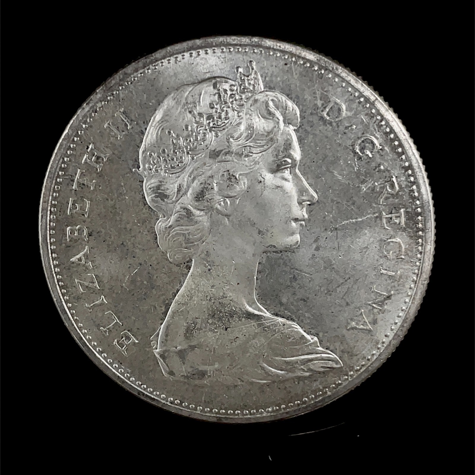 1965 PL Unc. $1 Canada Dollar .800 Silver Type 2 Small Beads Blunt 5.