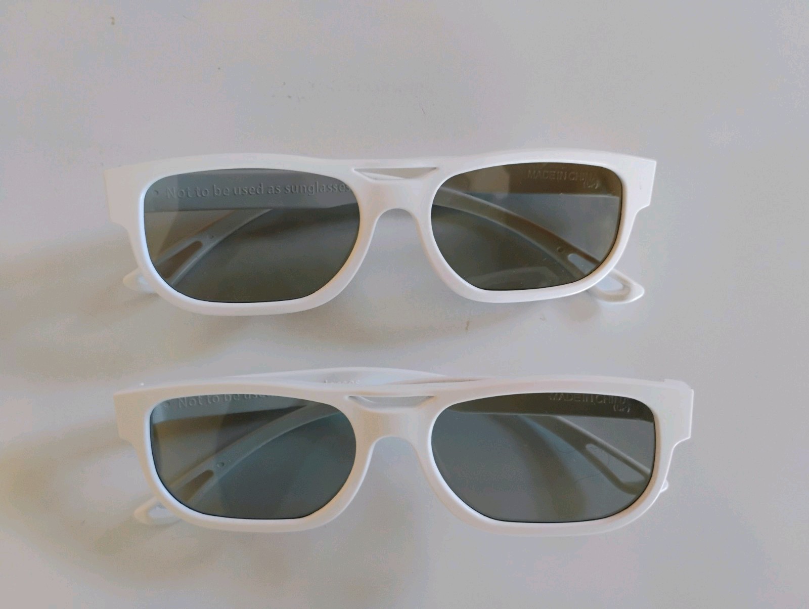 LG 3D Glasses AG-F200 One Bundle of Two White color glasses. Gently Used