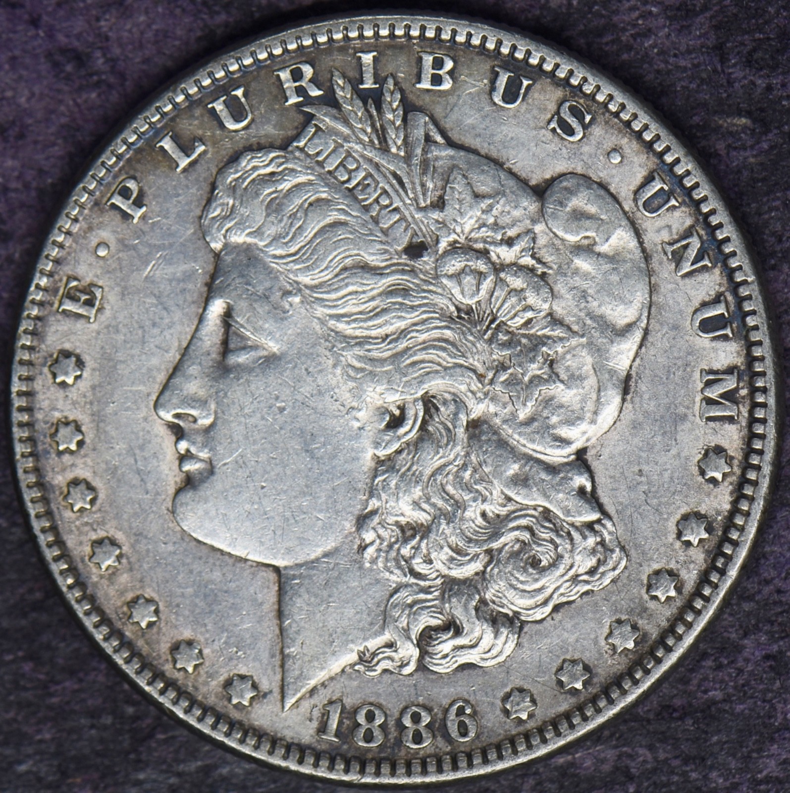 1886 Morgan Silver Dollar Toned - ✪COINGIANTS✪