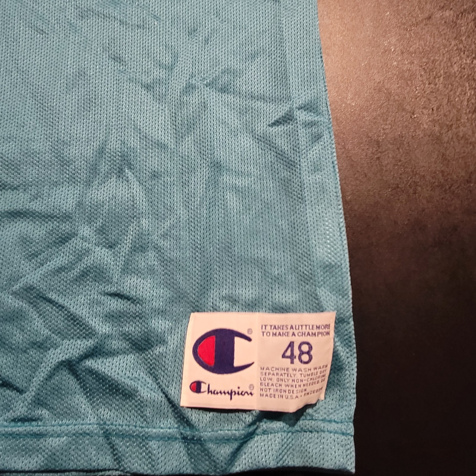 Vintage Mugsy Bouges Charlotte Hornets Basketball Jersey. Size 48