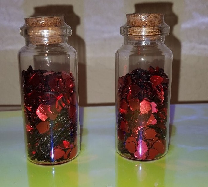 2 GLASS SMALL JARS VIALS OF CHUNKY RED HEART GLITTER