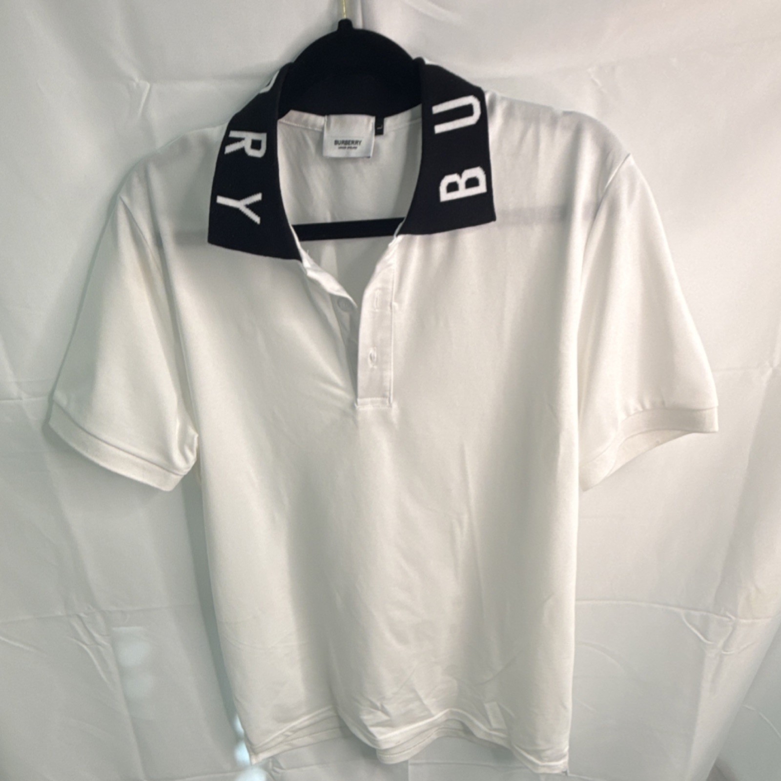 Elegant Burberry White Polo with Signature Logo Collar