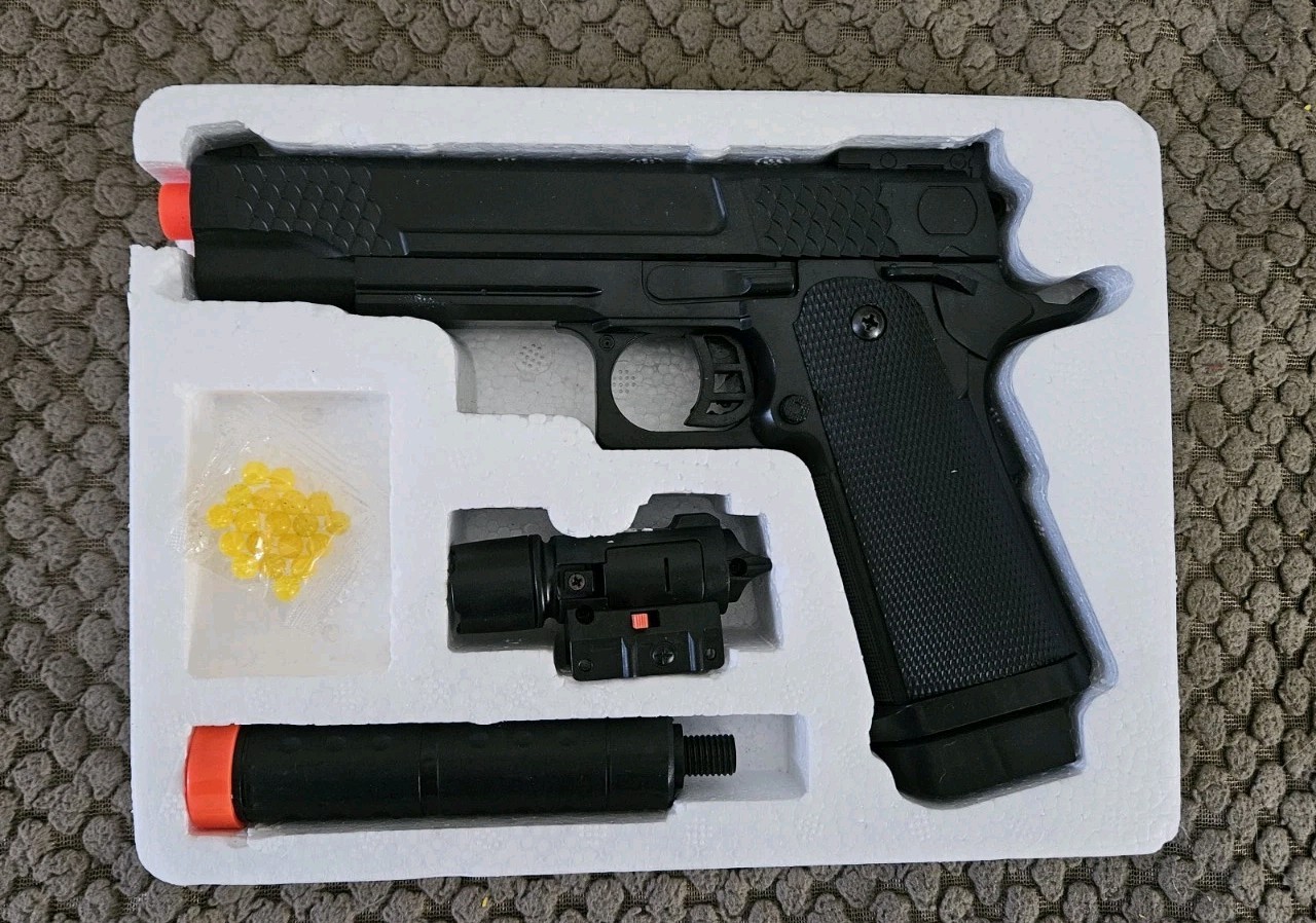 UK Arms P2002C Spring Powered Airsoft Pistol w/ Suppressor & Laser — 1:1 Scale —