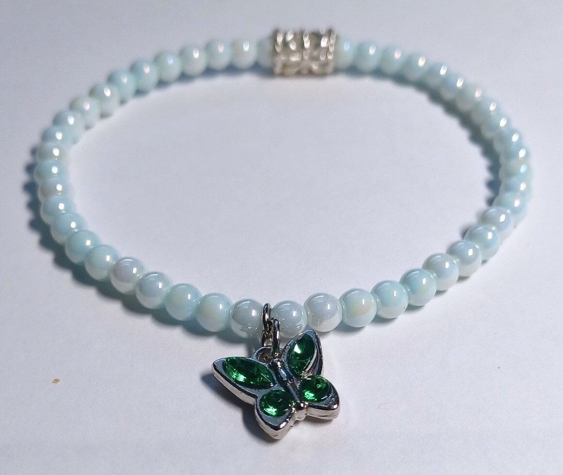 White Glass Beaded Bracelet with Dangling Butterfly Charm