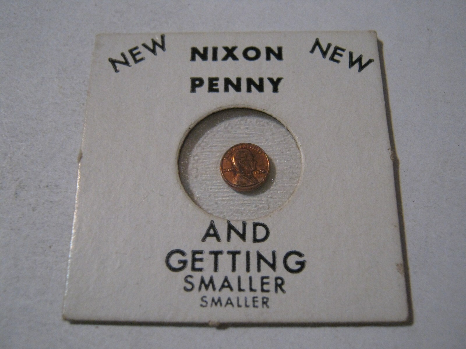 1974 New "Nixon" Penny "Getting Smaller" in Square 2 x 2 w/ Dick's Face