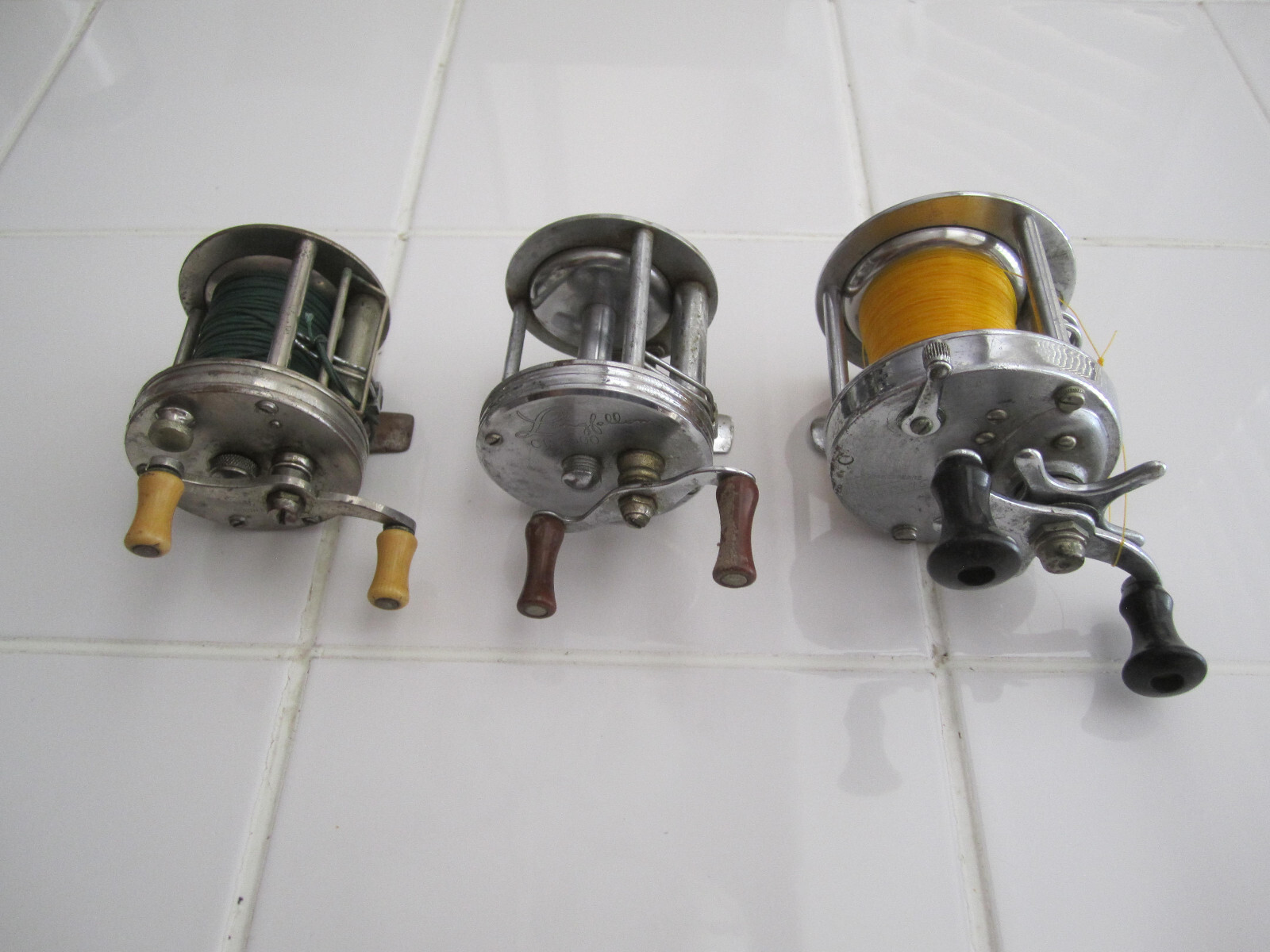 3 Vintage Fishing Reels Oreno 1000 Longfello CR 2000 Shakespeare Service 1944 GE