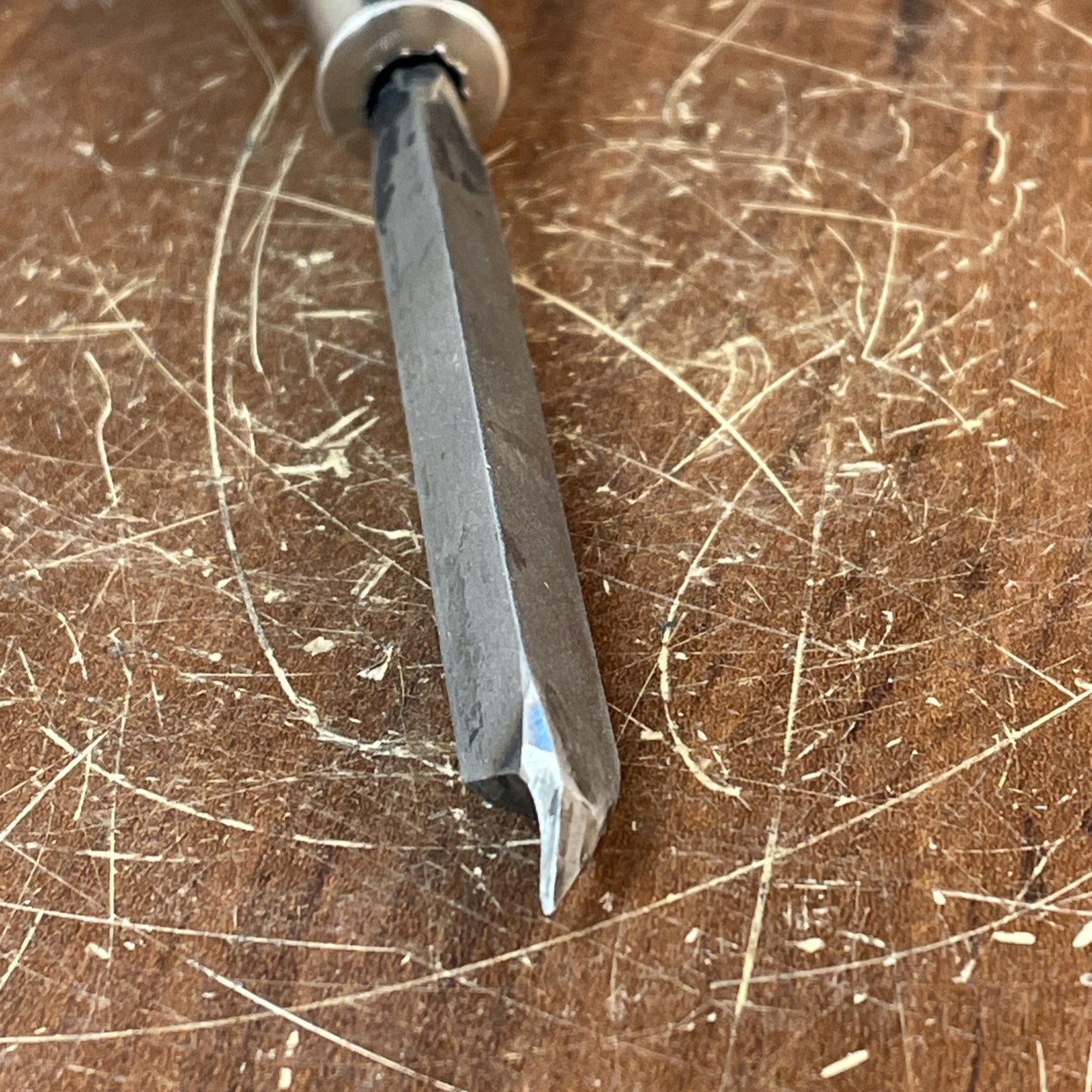 Triangular Scraper