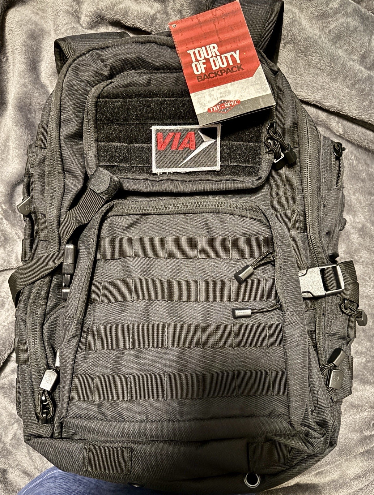 VIA METROPOLITAN TRANSIT TOUR OF DUTY BLACK BACKPACK