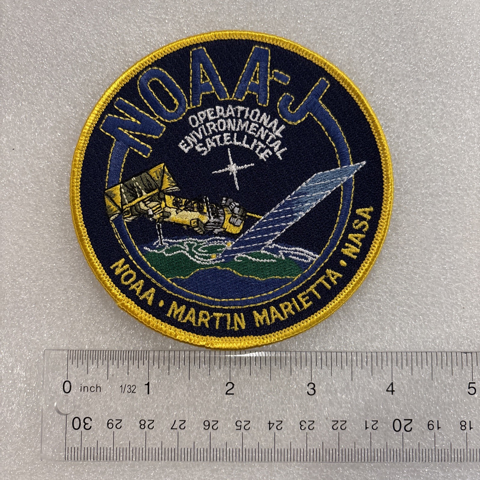 NOAA-J Operational Environmental Satellite mission patch