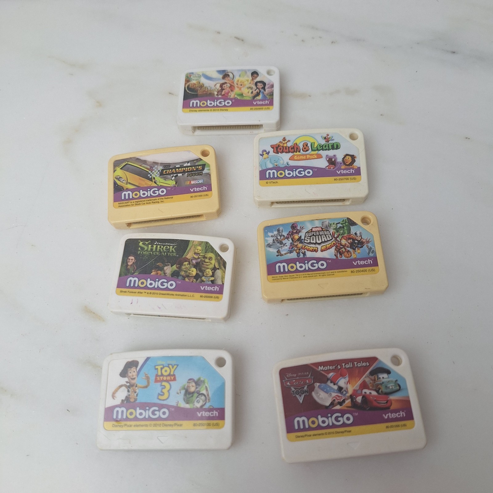 Lot of 7 Vtech Mobigo Games, Cars, Shrek & toy story 3 please see Pic's For Titl