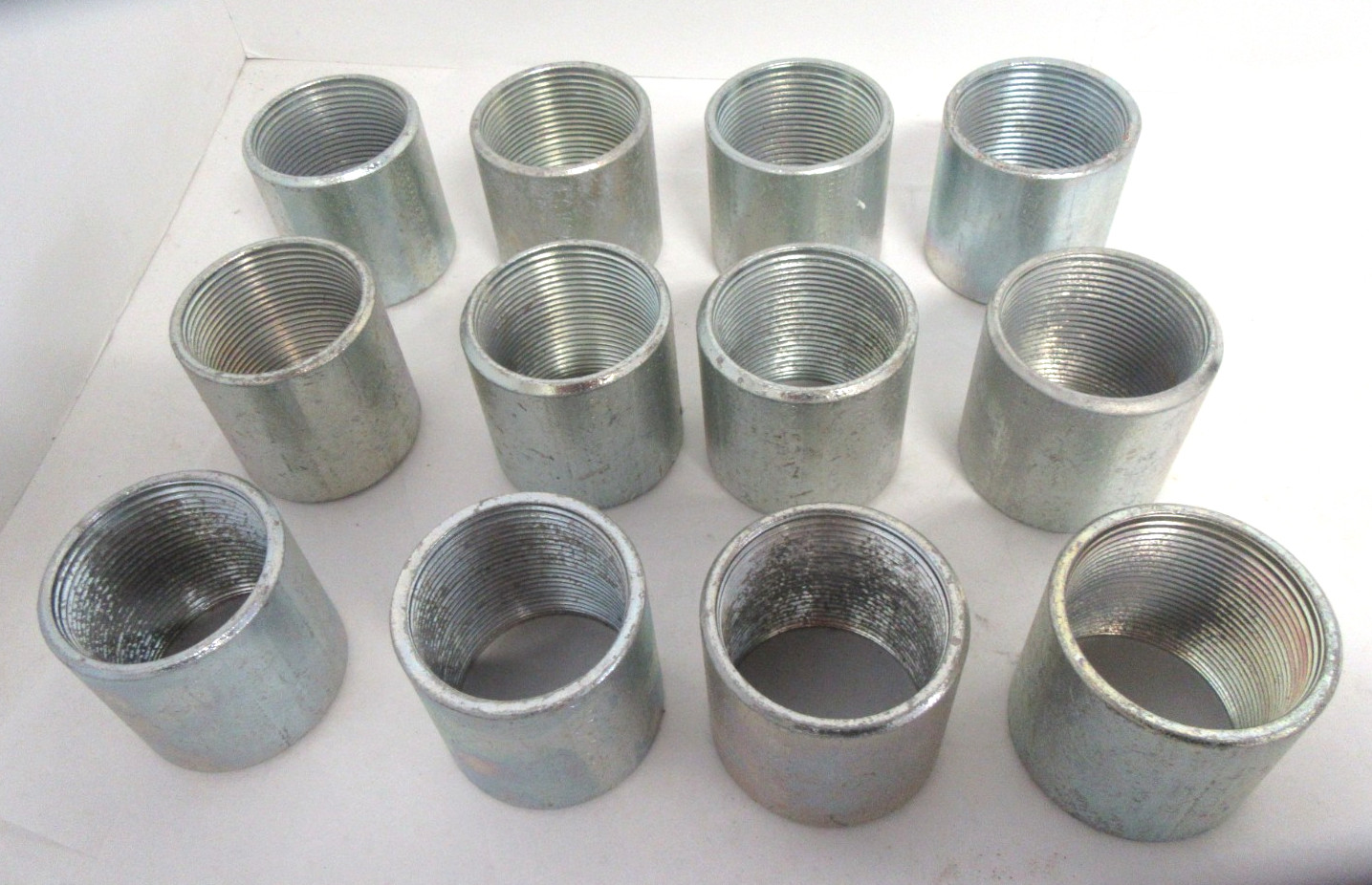 Lot of 12 New Old Stock 1-1/2" Full Threaded Steel Couplings Ridgid Conduit IMC