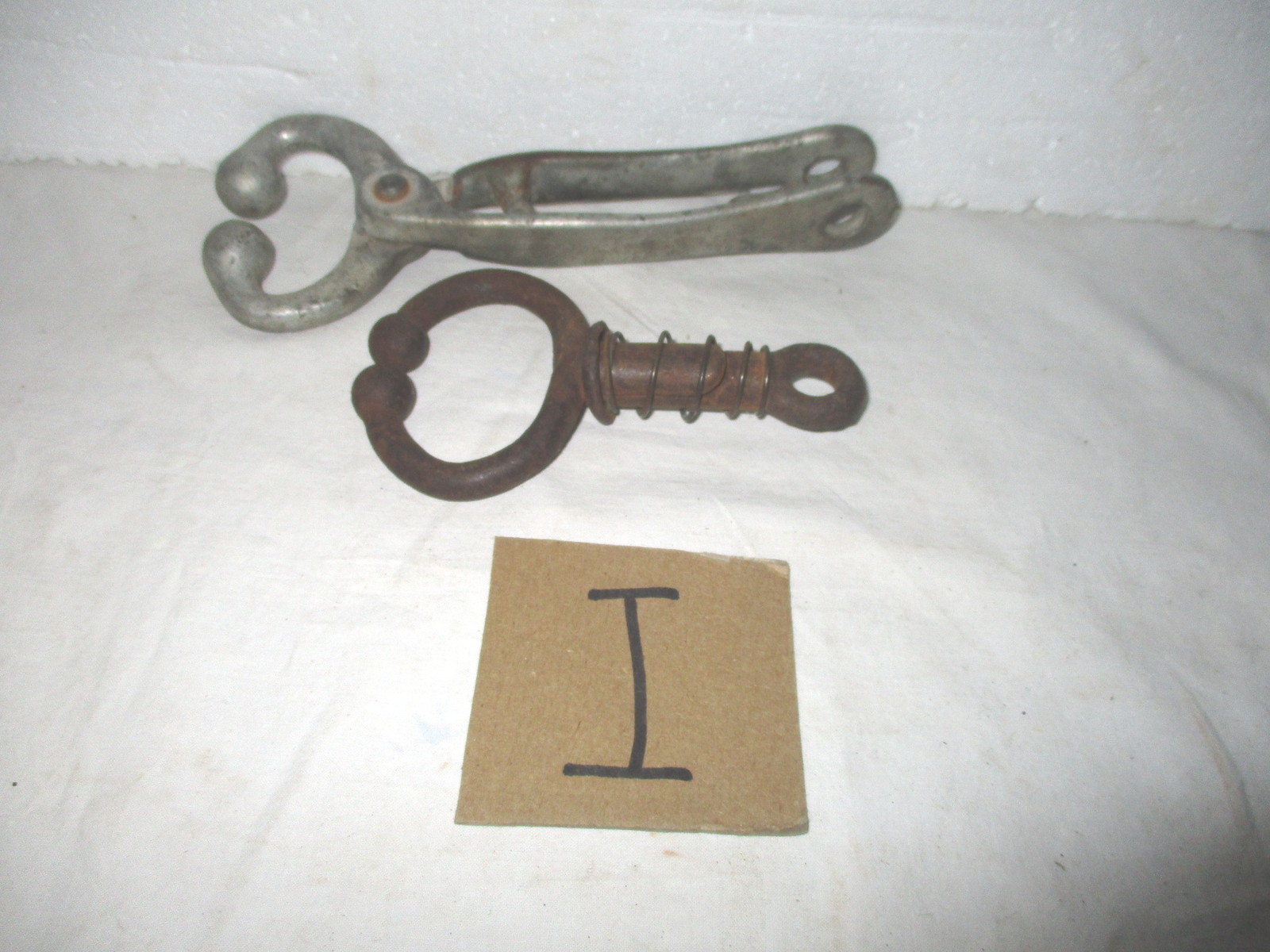 Two antique vintage bull's nose leader control tool pliers
