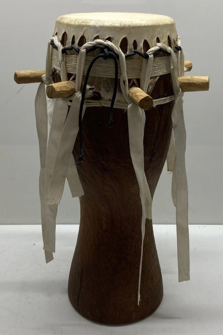 Wood and animal hide drum