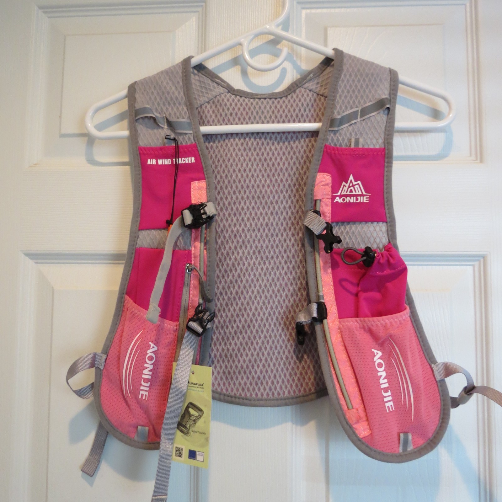 Aonijie Air Wind Track 5L Hydration Reflective Vest Pink Grey (No Bladder) NEW