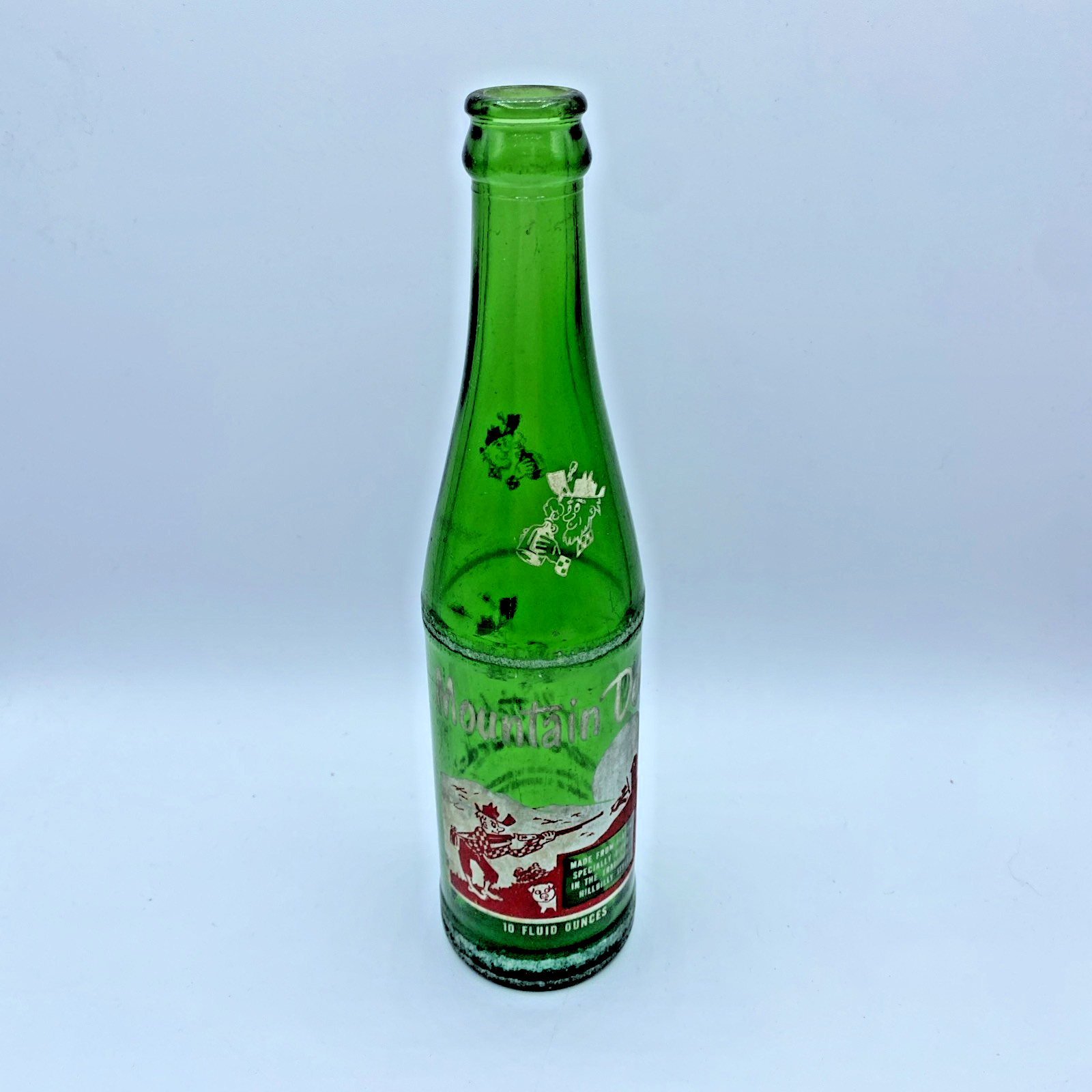 Mountain Dew Hillbilly Vintage Soda Bottle Green 10oz"it'll tickle your innards"