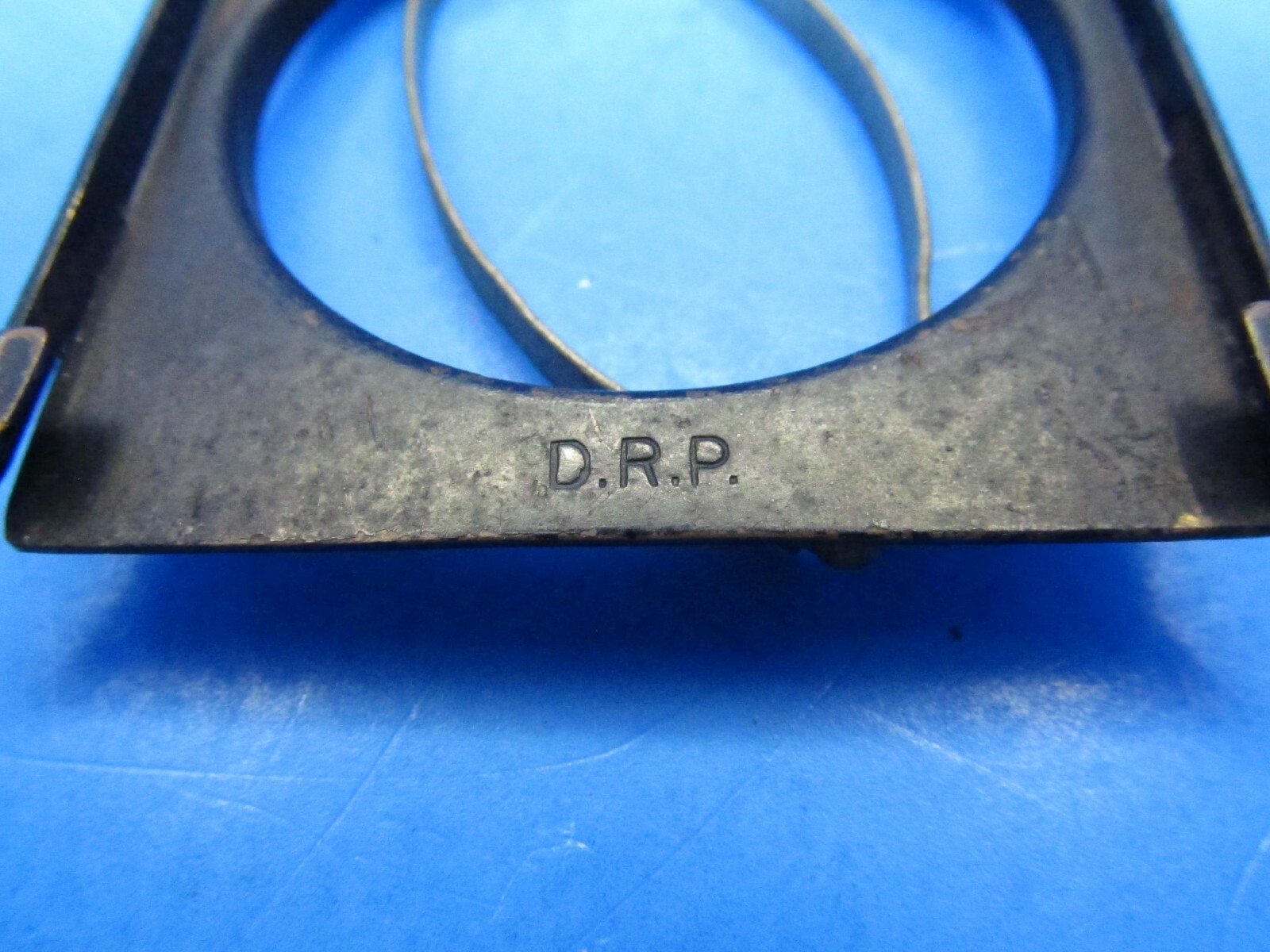 unique small filter holder marked RHACO DRP GERMANY attaches w/ spring clamps