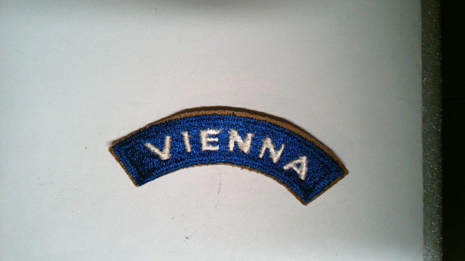 MILITARY PATCH SEW ON US ARMY TAB THAT SAYS VIENNA AS IN AUSTRIA WW2 ERA