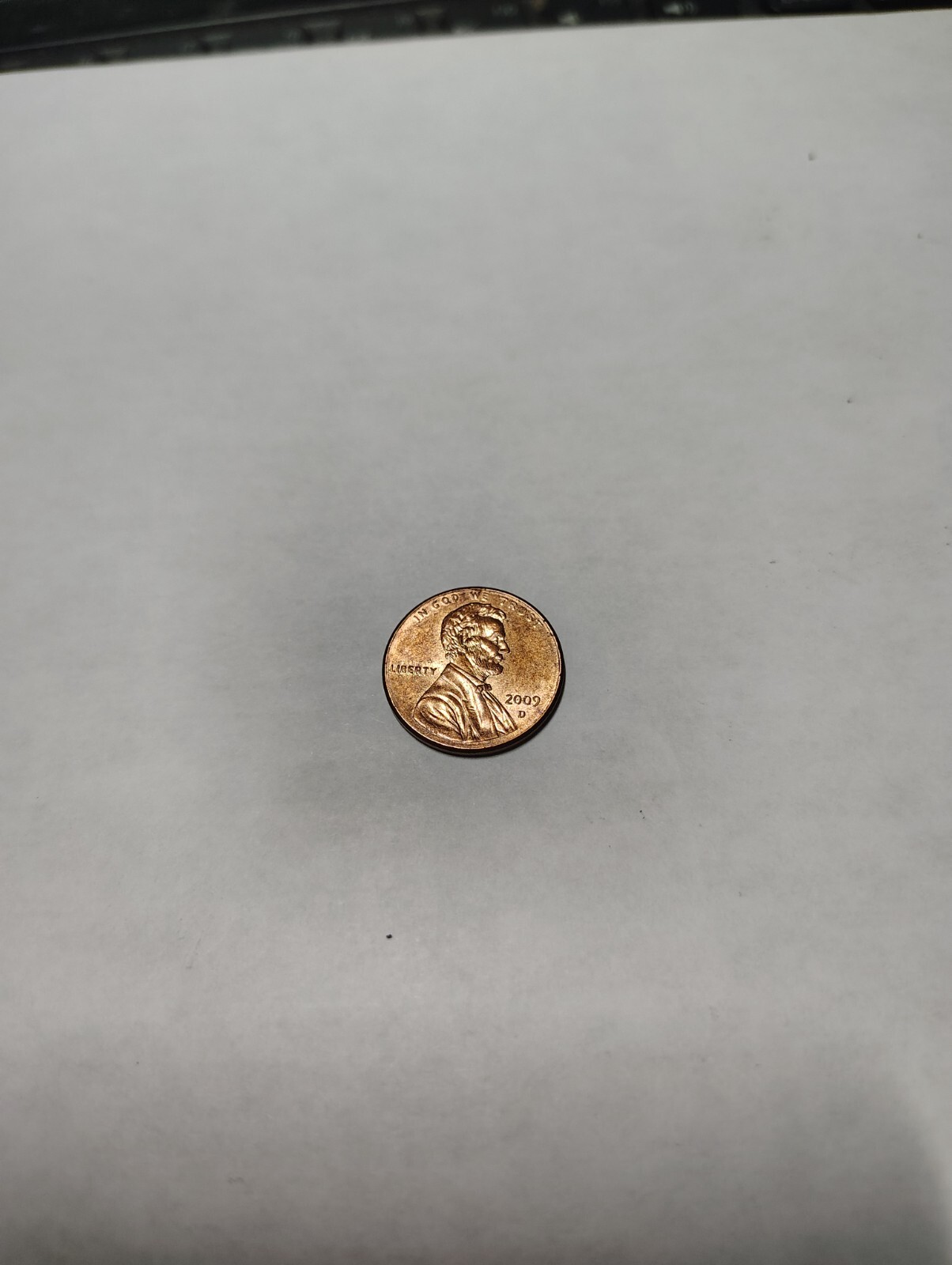 2009 D Man Reading A Book On A Log Penny 1 Cent Coin