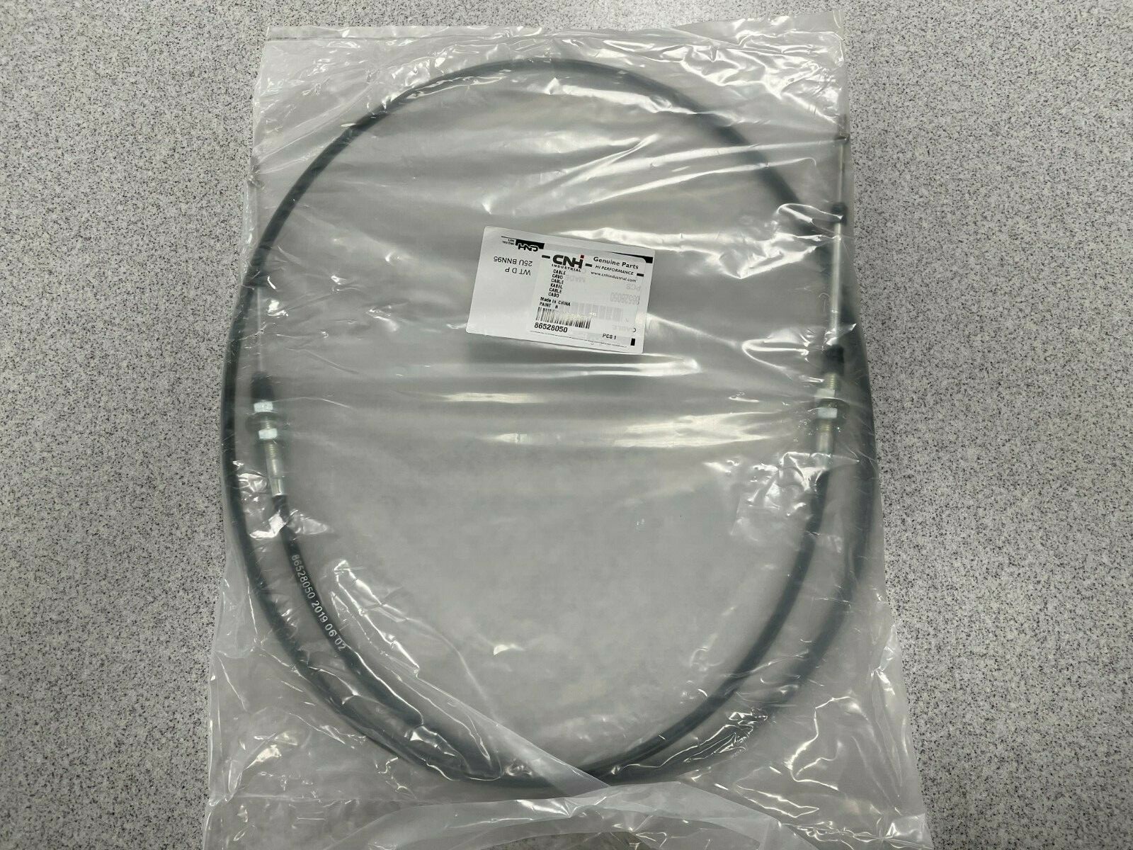 New OEM New Holland Cable Part # 86528050