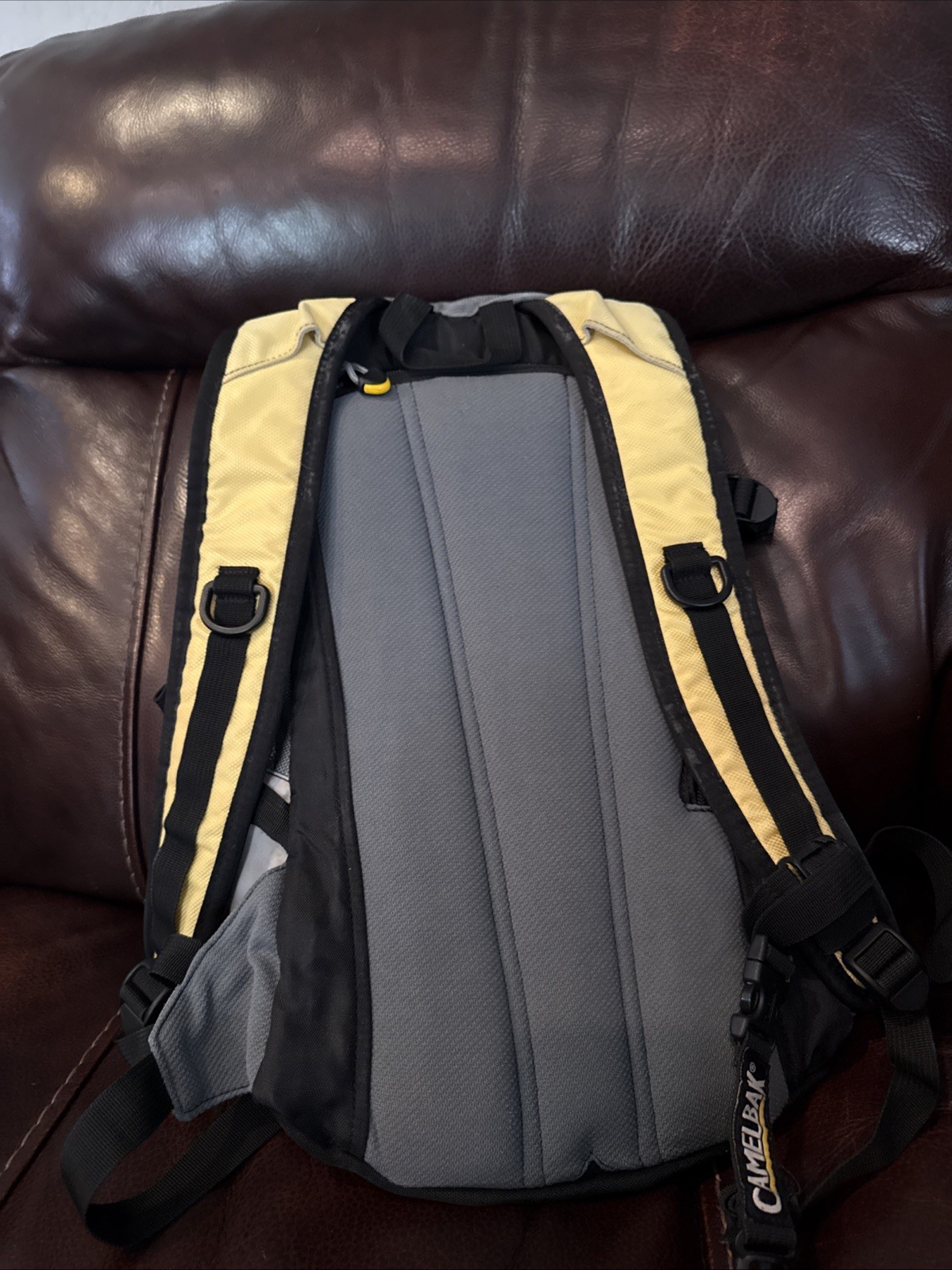 Camelbak Hydration Backpack with Bladder. Small. Grey and Yellow. Excellent