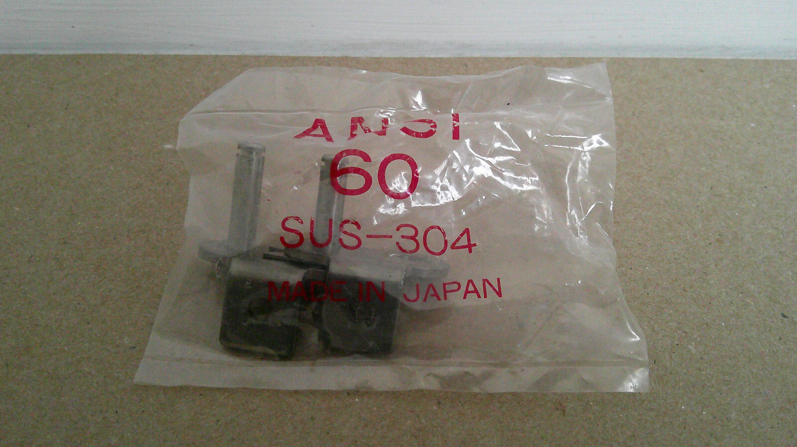 NEW CONNECTING LINK 60SS K-1 BENT BOTH SIDES, 1 HOLE, S.S. MADE IN JAPAN.